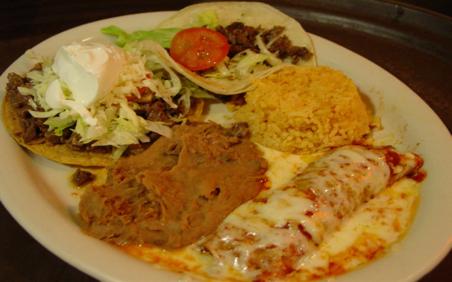 Order 31. Combination Plate food online from Perico's Mexican Cafe & Bar store, Houston on bringmethat.com