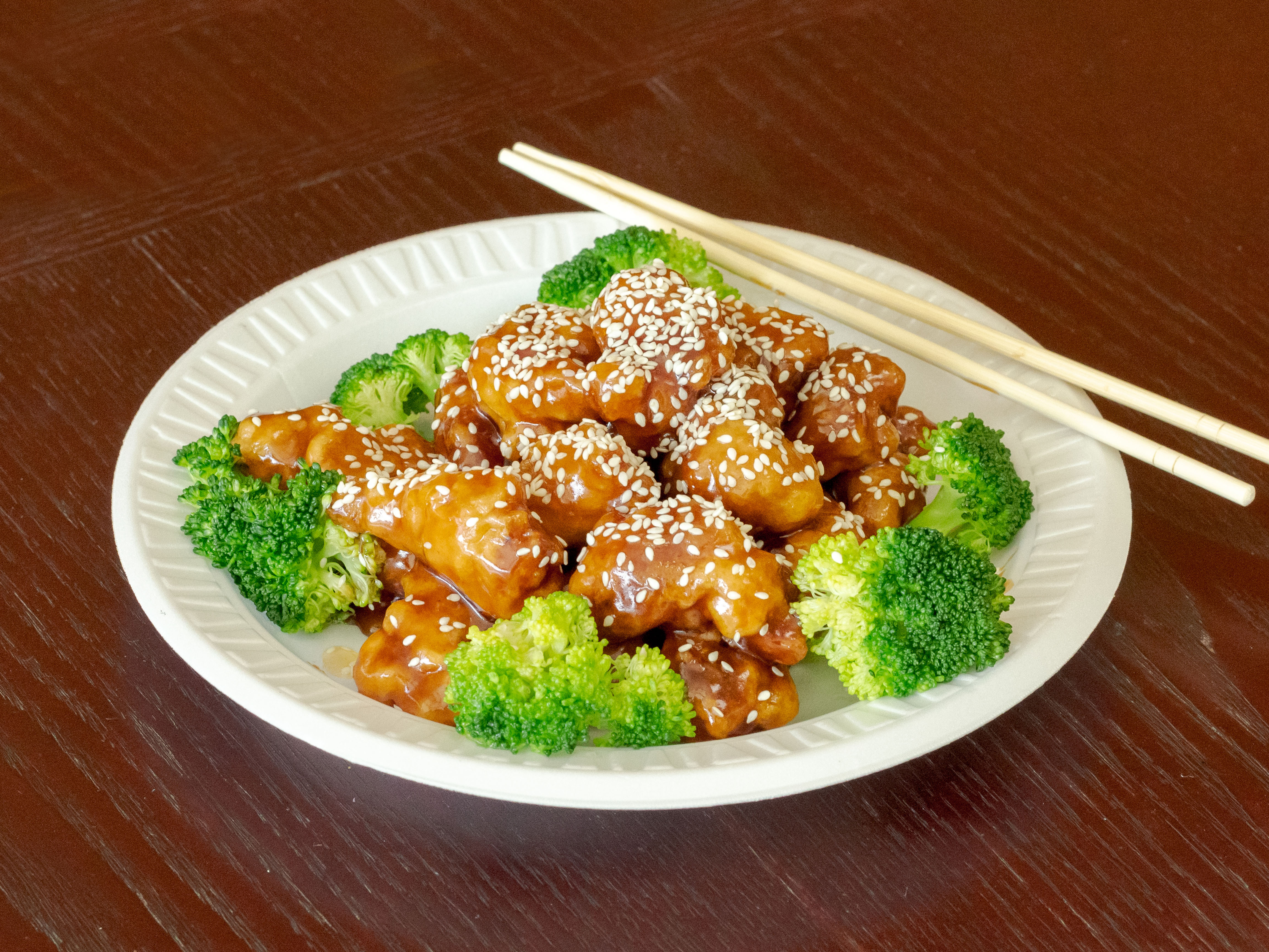Order 87. Sesame Chicken food online from China Wok store, Greensboro on bringmethat.com