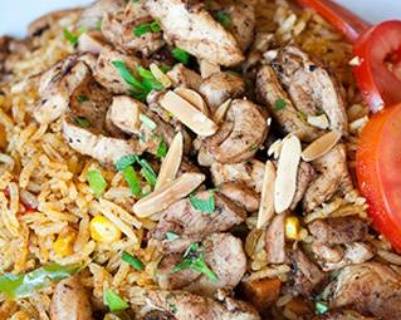 Order Chicken Biryani with roasted nuts food online from Aladdin Cafe store, San Diego on bringmethat.com