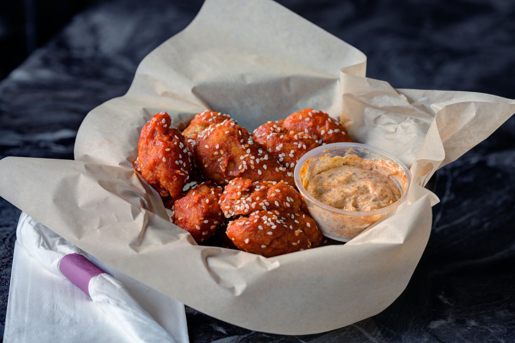 Order Chicken Sriracha Bites with Cajun ranch sauce food online from Sierra Madre Saloon store, Camp Hill on bringmethat.com