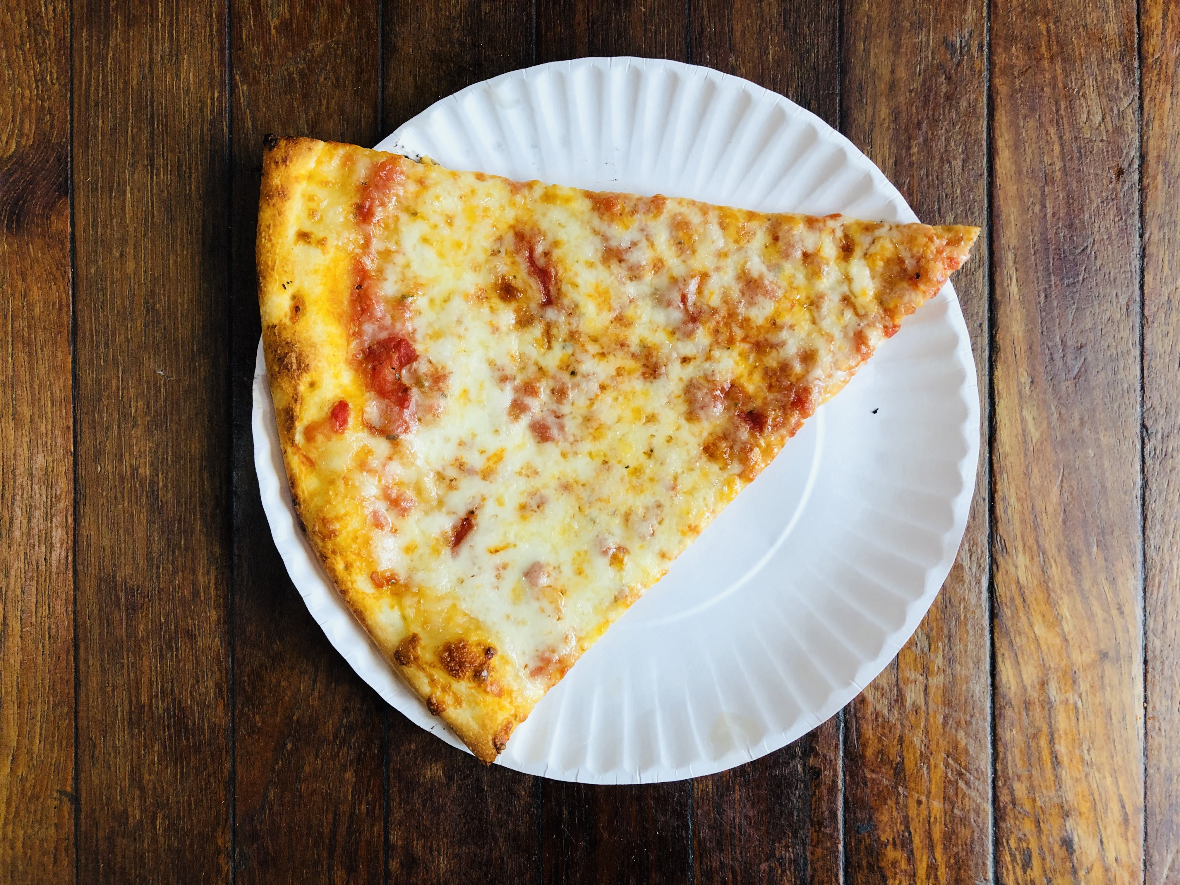 Order Cheese slice food online from Champion Pizza store, New York on bringmethat.com