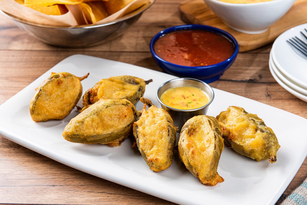 Order Firecracker Stuffed Jalapeños food online from On The Border store, Lewisville on bringmethat.com
