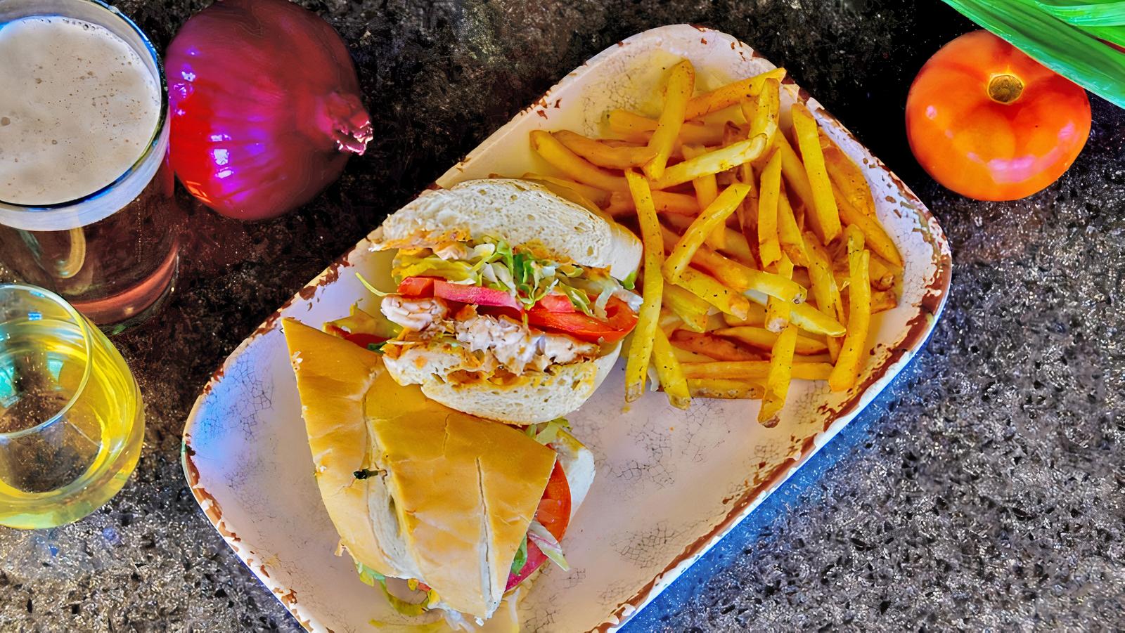 Order Catfish Po’ Boy food online from Voodoo Daddy Steam Kitchen store, Tempe on bringmethat.com