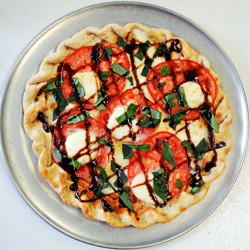 Order Caprese Pizzetta - Personal food online from Jp Pizza & Grill store, Wilmette on bringmethat.com