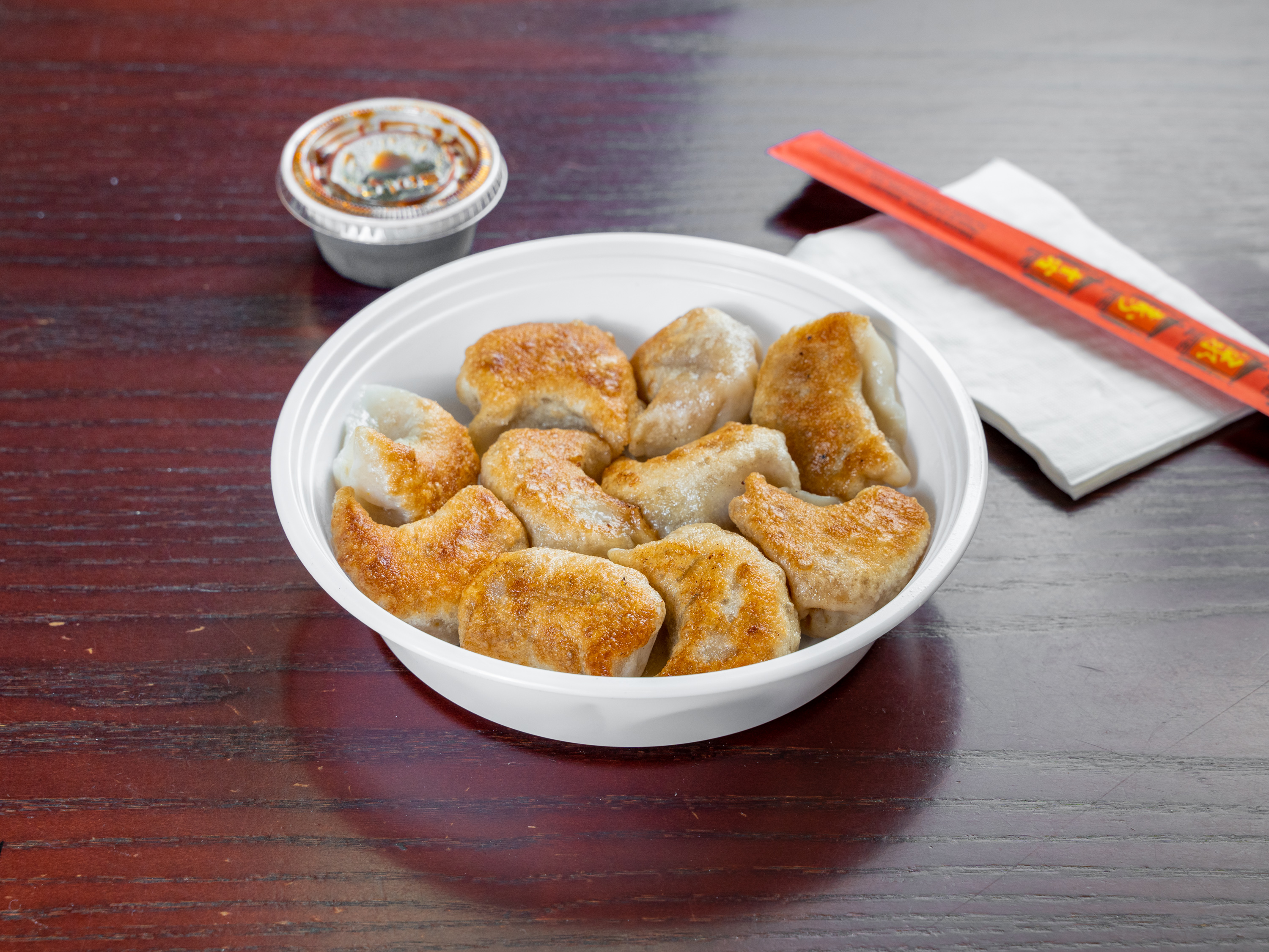 Order 4. Fried Dumplings food online from New China King store, Stamford on bringmethat.com