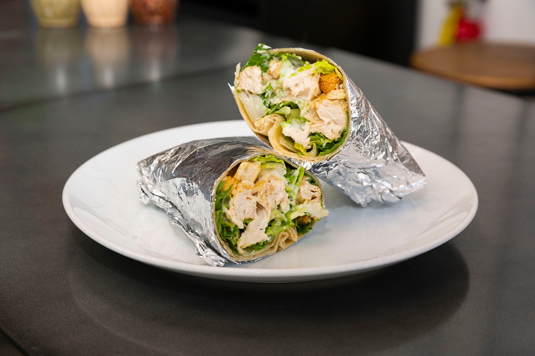 Order Grilled Chicken Ceaser Wrap - Wraps food online from College Pizza store, Boston on bringmethat.com