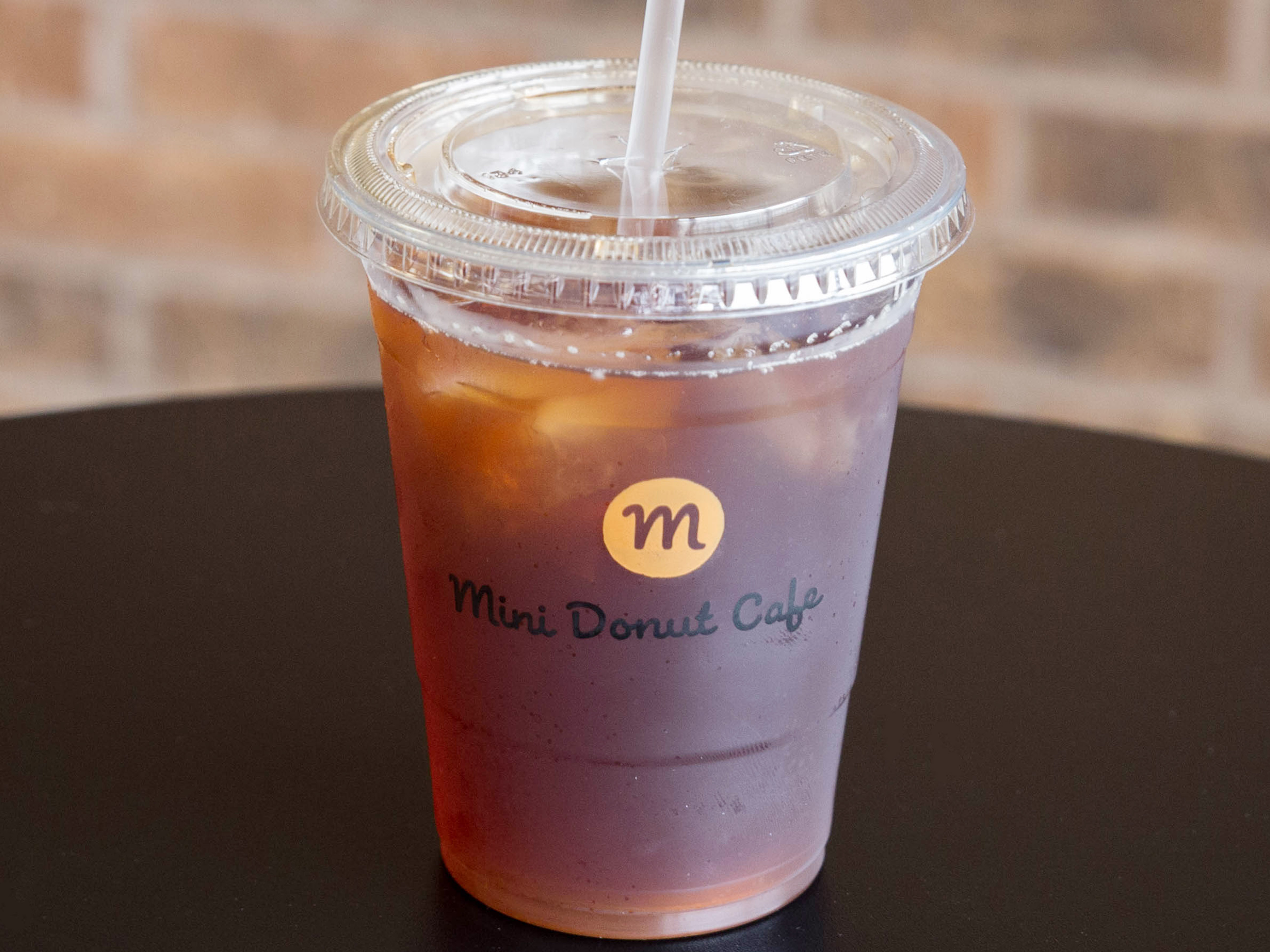 Order Hand-Picked Sweet Tea of the Day - Peach or choose other flavors food online from Mini Donut Cafe store, Chicago Ridge on bringmethat.com