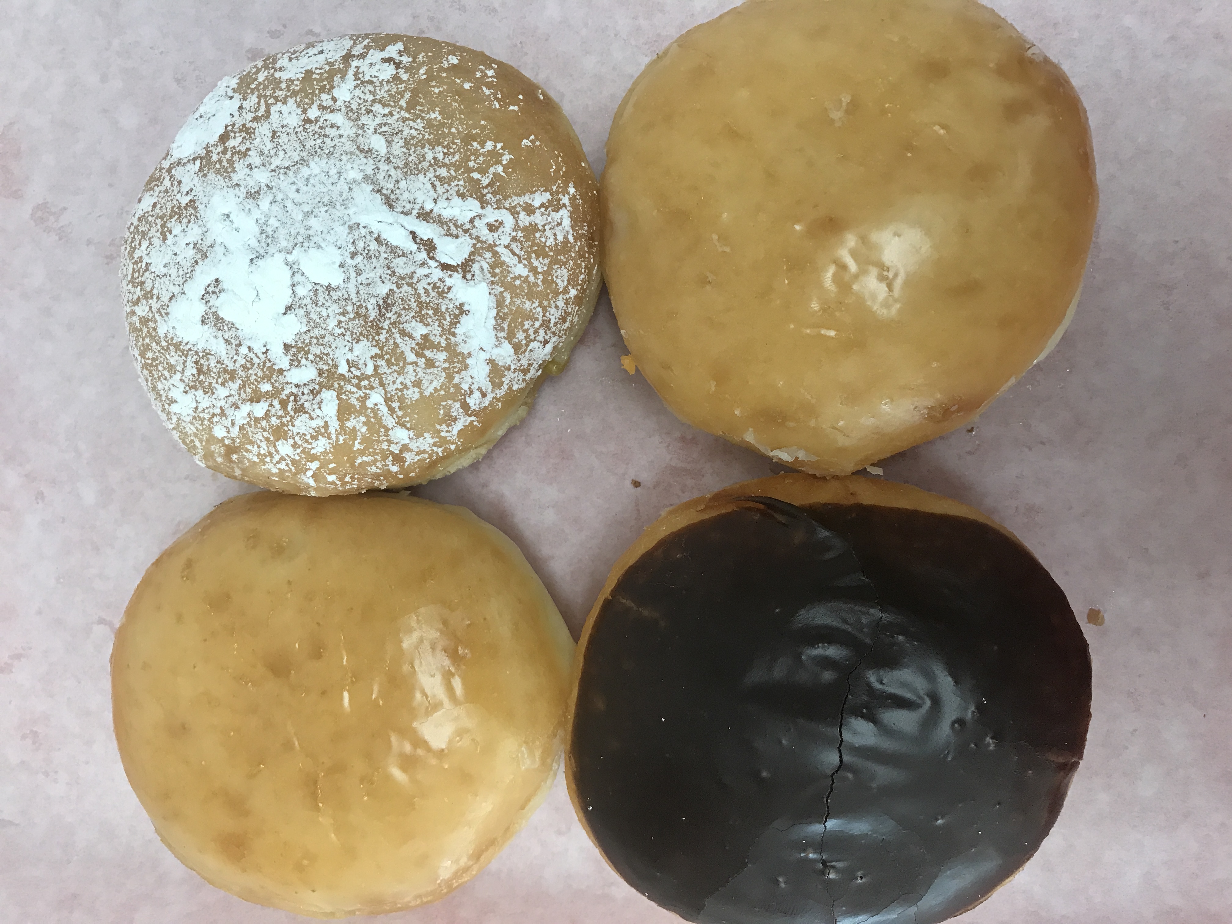 Order Raspberry Jelly Filled Donut  food online from Michael Donuts store, Hungtington Beach on bringmethat.com