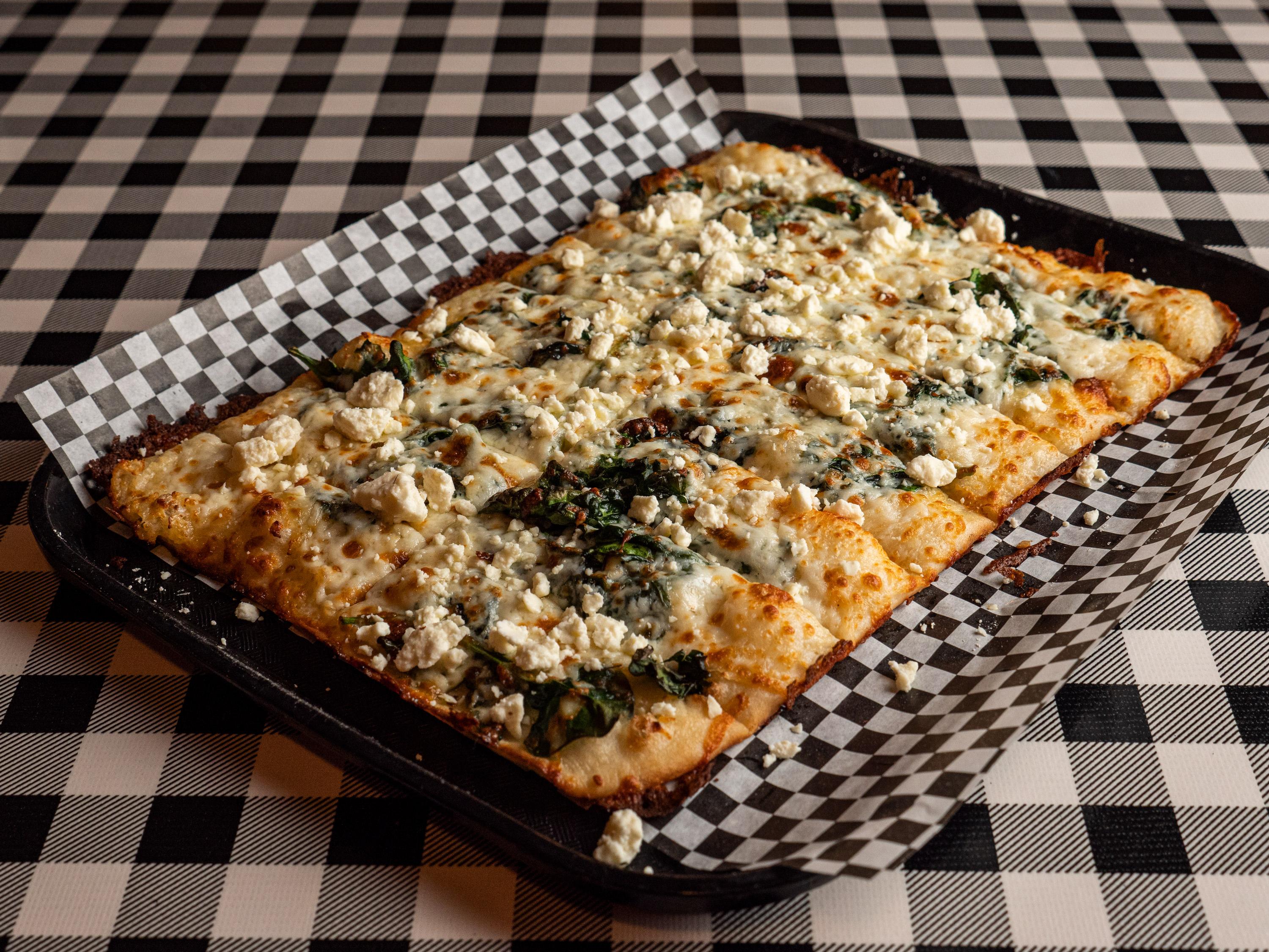 Order SPINACH FETA FLATBREAD food online from Paninos store, Fort Collins on bringmethat.com