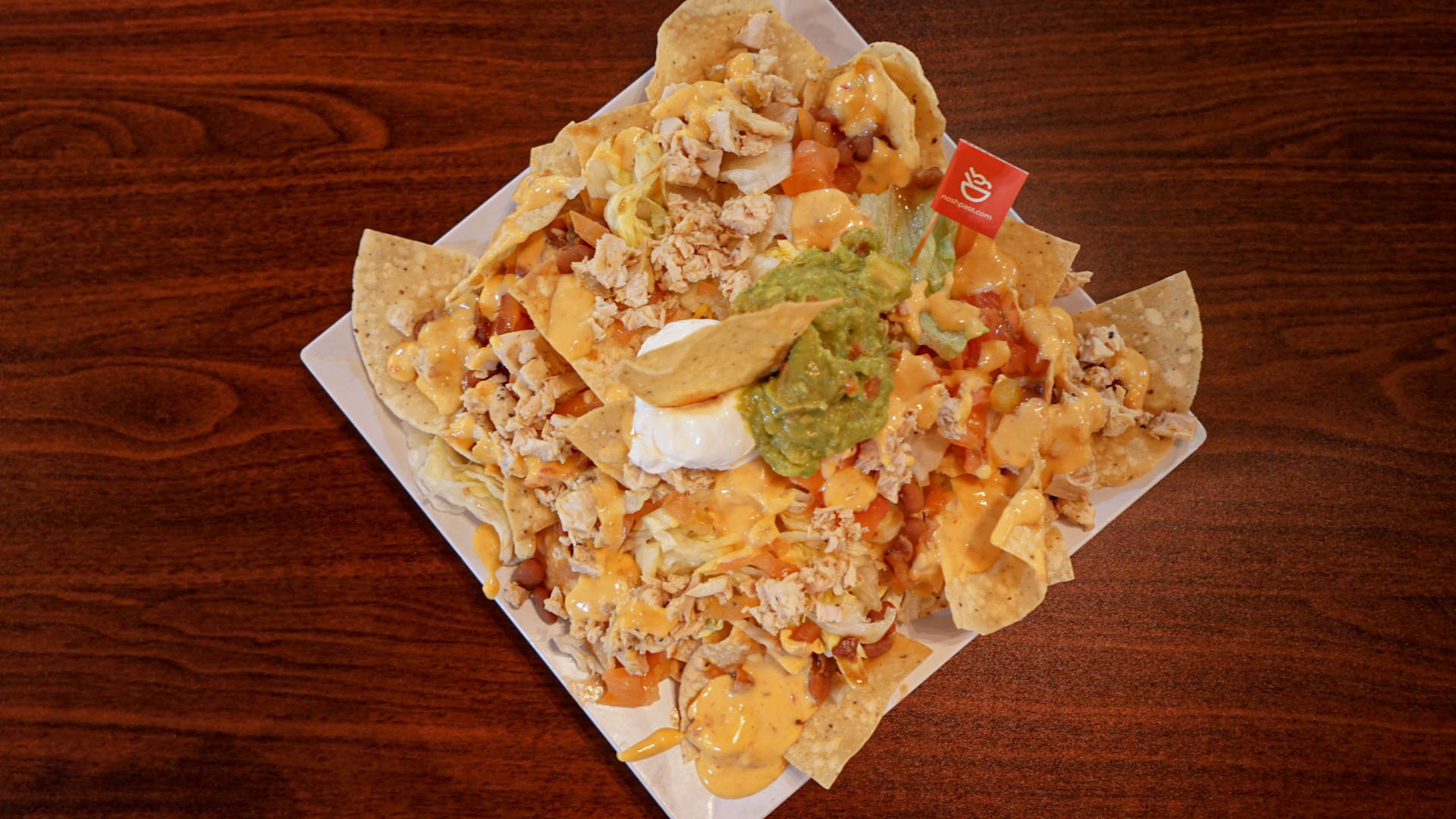 Order Loaded Nachos with chicken. food online from Cassidy Mesquite Kitchen store, Houston on bringmethat.com