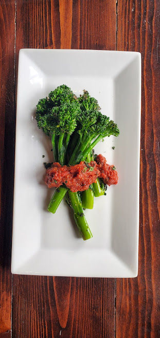 Order Broccolini food online from Aj Hudson's Public House store, Chicago on bringmethat.com