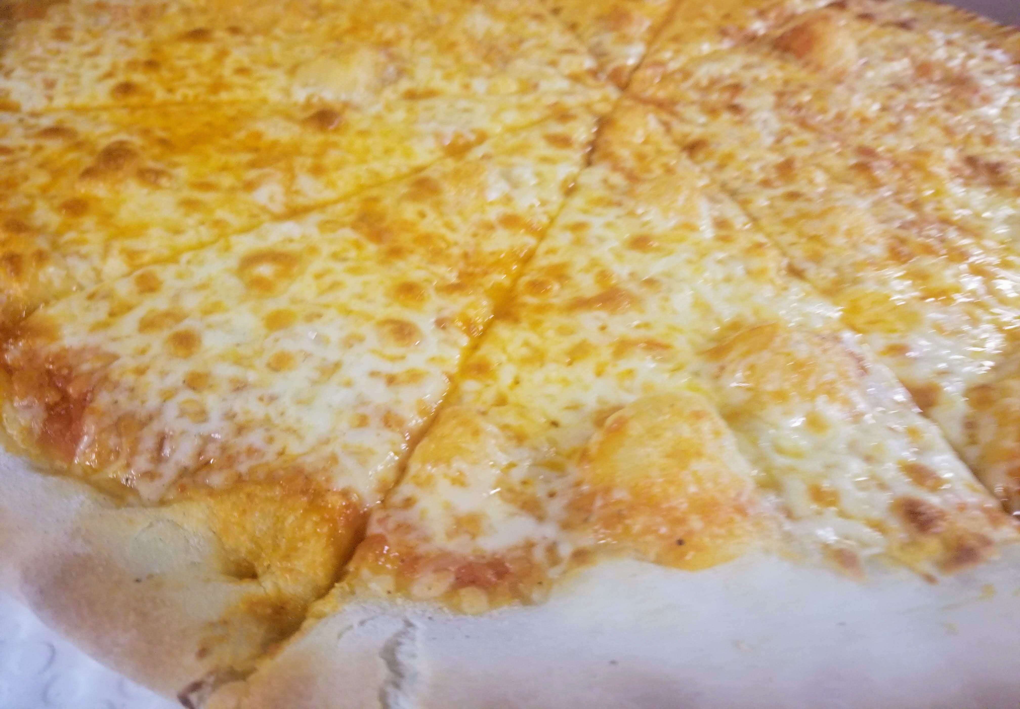 Order Cheese Pizza - Small 10" (4 Cut) food online from Novotny's Groceries & Pizza store, Worthington on bringmethat.com