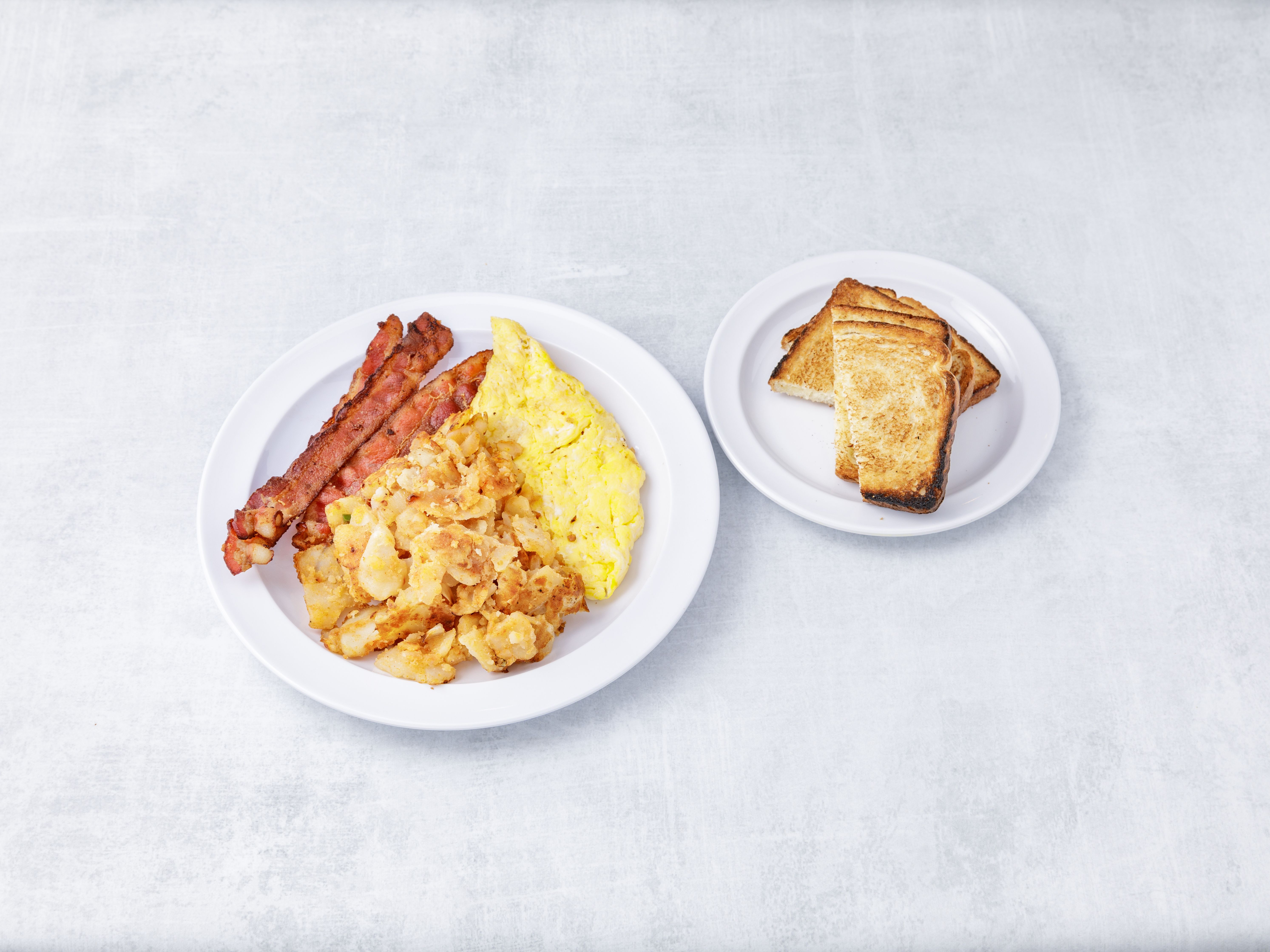 Order 2 Egg Any Style with Bacon food online from National Diner store, Bronx on bringmethat.com