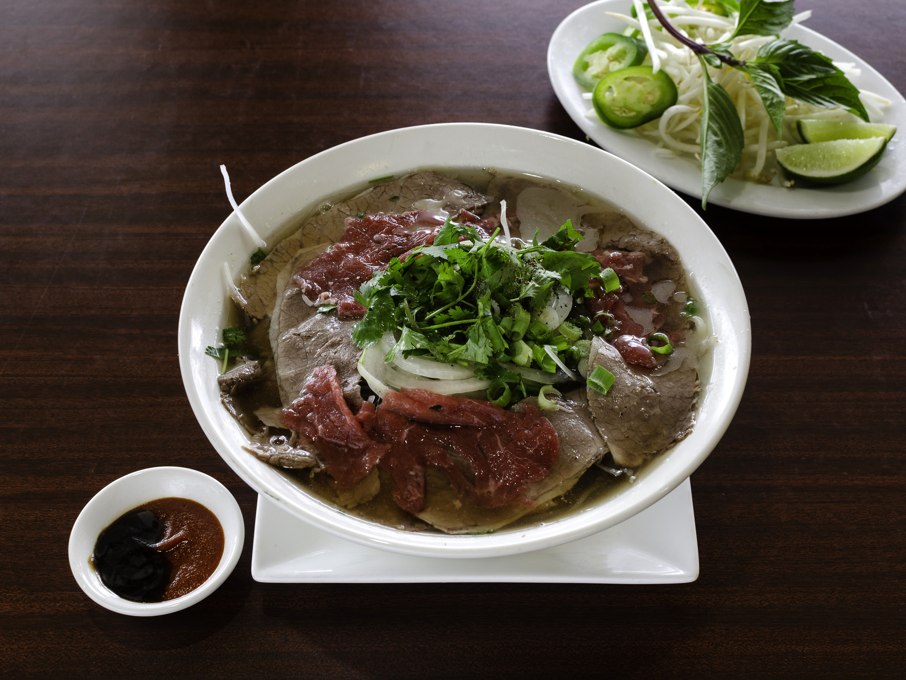 Order Sliced Eye Round Steak and Well-Done Brisket Pho (Tai + Chin) food online from Pho Kim store, Federal Way on bringmethat.com
