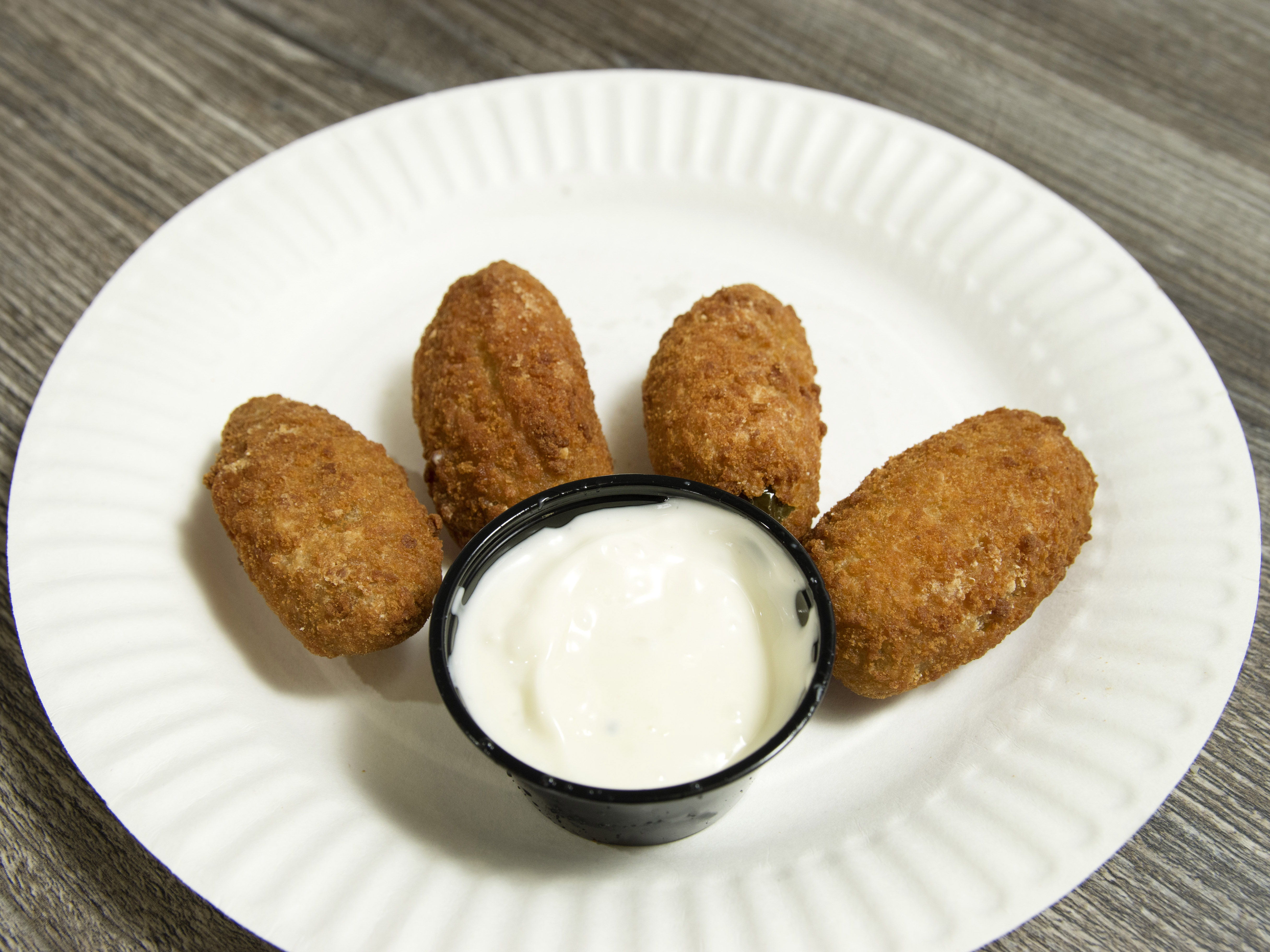 Order 8 Pieces Jalapeno Poppers food online from Roma's Pizza store, Oceanside on bringmethat.com