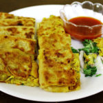 Order 14. Mughlai Paratha food online from Taj Restaurant store, Warren on bringmethat.com