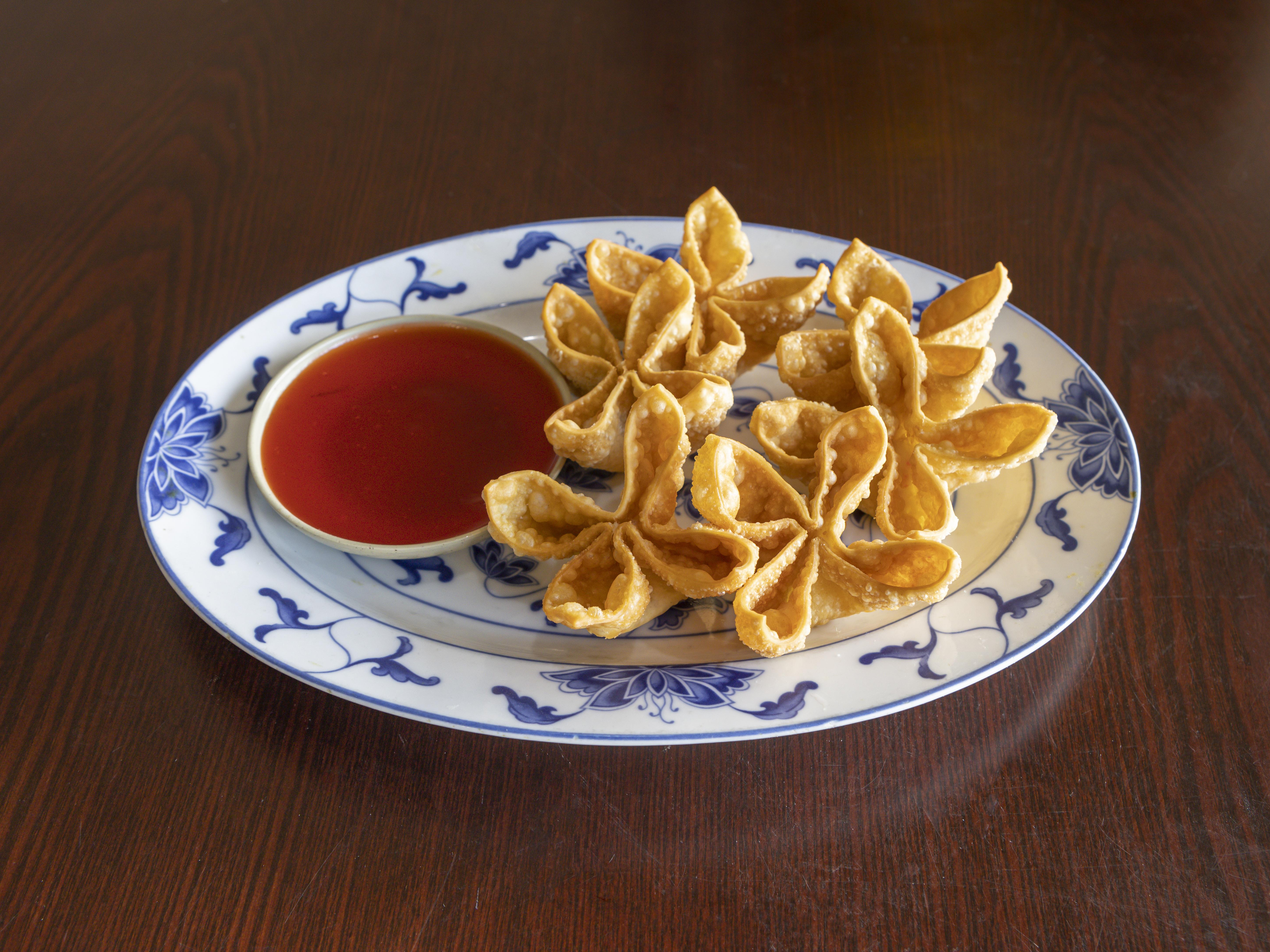 Order A4. Crab Rangoon food online from Lucky China store, Kennesaw on bringmethat.com
