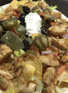 Order Macho Nachos food online from Charlie D's Seafood & Chicken store, Kansas City on bringmethat.com