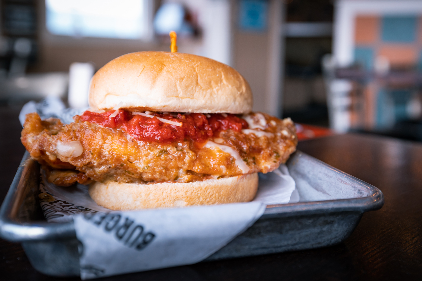 Order Chicken Parm Sandwich food online from Sickies Garage Burgers store, Sioux Falls on bringmethat.com
