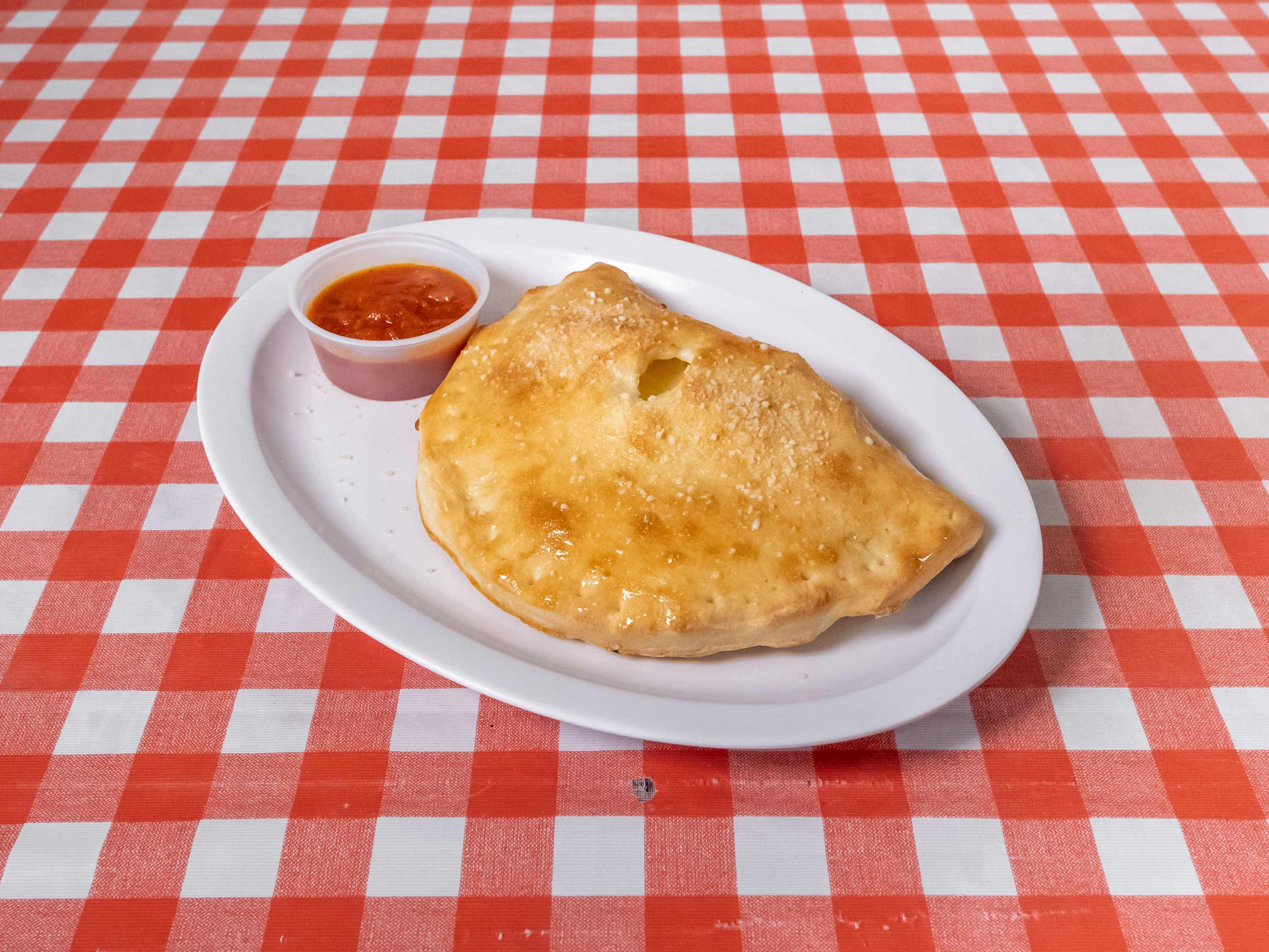 Order Calzone food online from Luna Pizza store, Glendale on bringmethat.com