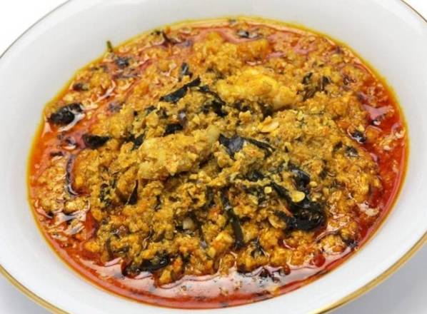Order FUFU WITH EGUSI SOUP AND FISH food online from Mama Afrika Food Llc store, Newark on bringmethat.com