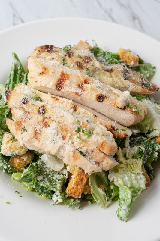 Order Chicken Caesar Salad food online from Venetian Palace store, Edgewood on bringmethat.com