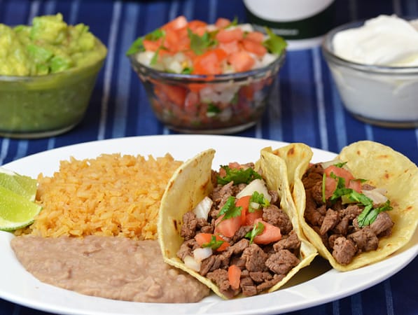 Order 8. Carne Asada Tacos (2) food online from Federico's Mexican Food store, Phoenix on bringmethat.com