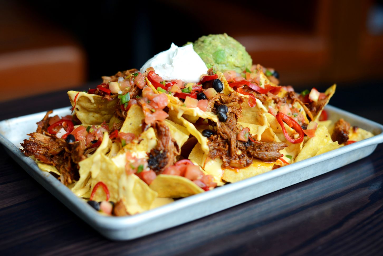 Order Loaded BBQ Pulled Pork Nachos food online from Conner Kitchen + Bar store, Indianapolis on bringmethat.com