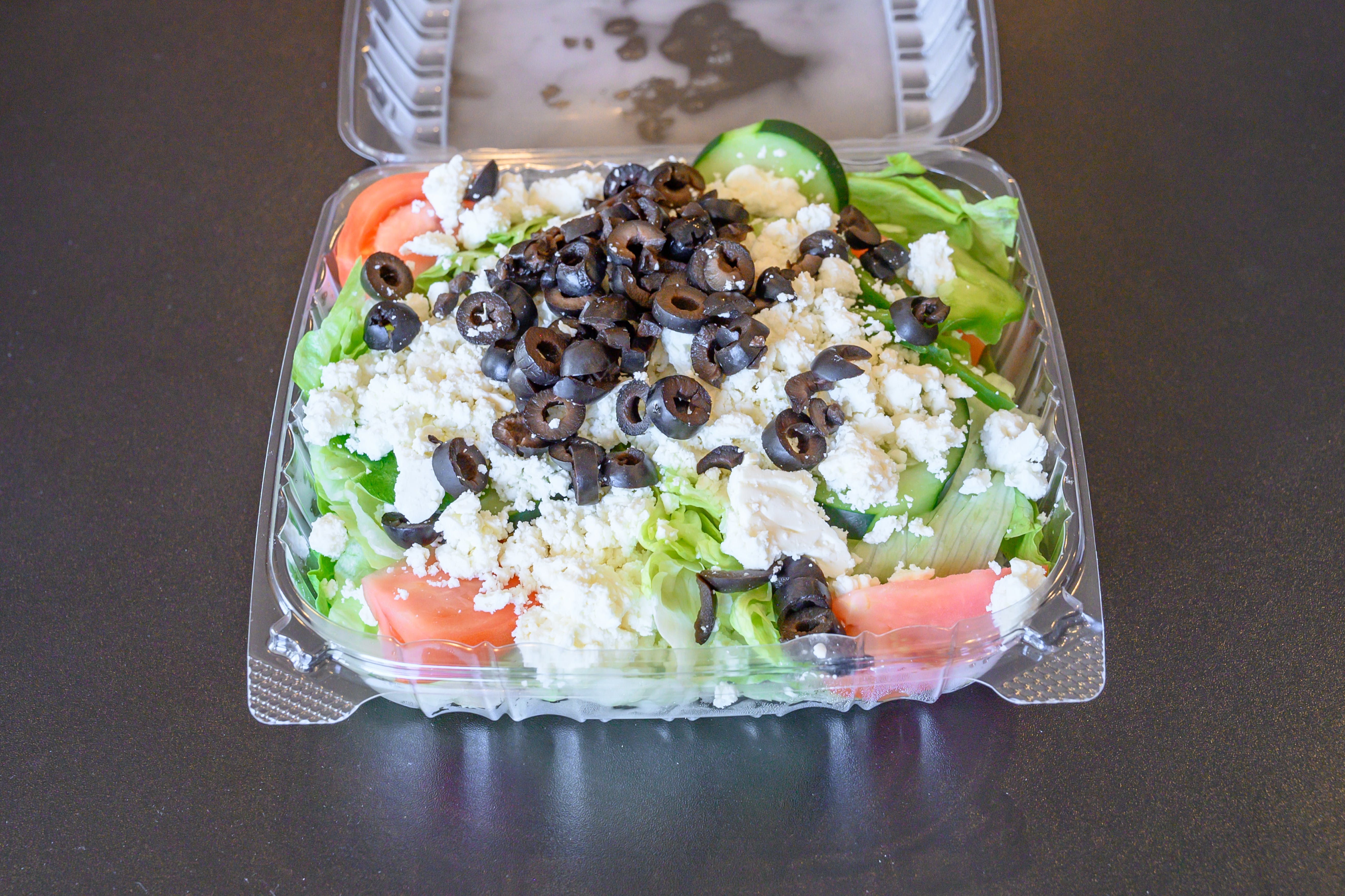 Order Greek Salad - Salad food online from Suppa Pizza & Subs store, North Billerica on bringmethat.com