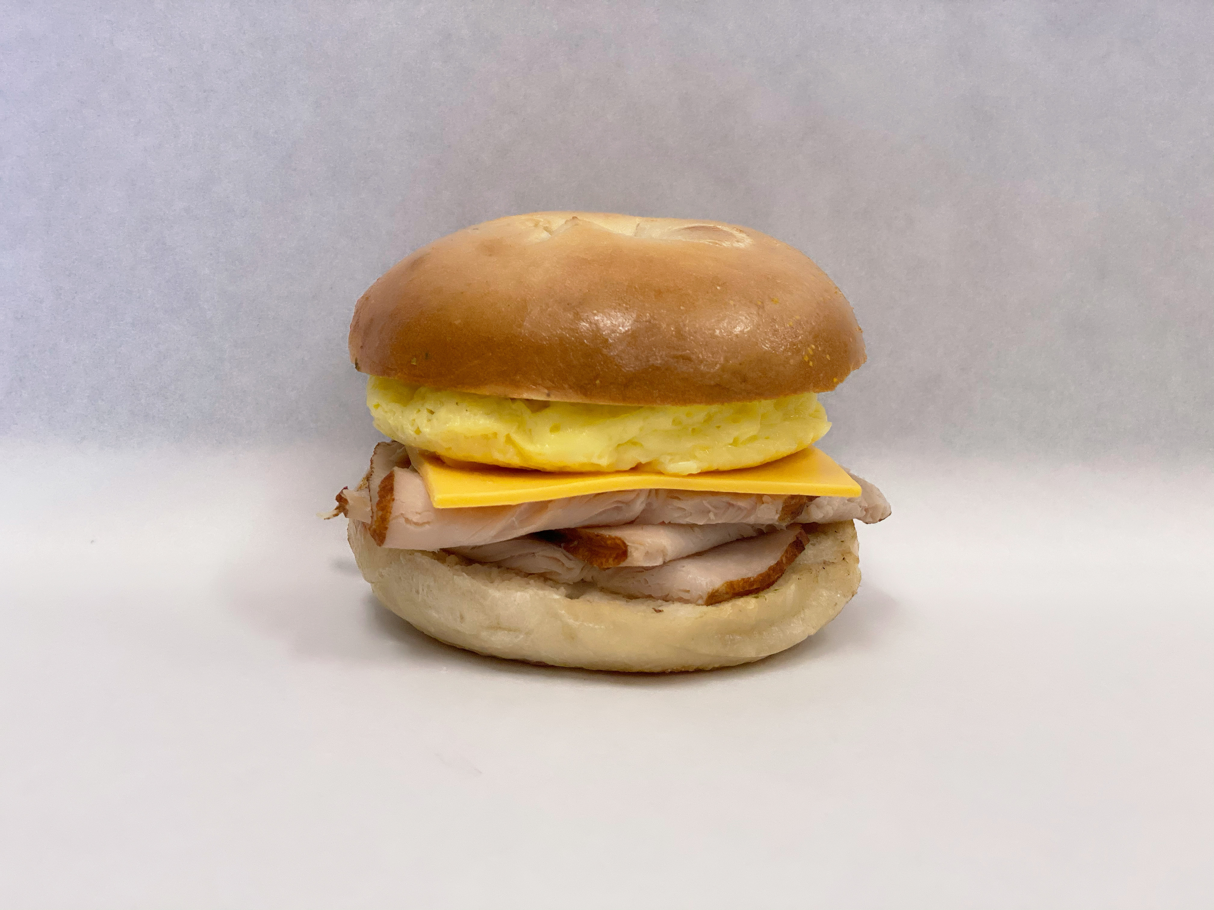 Order 2B. Turkey, Egg & Cheese food online from Bagel Place Cafe store, Sunnyvale on bringmethat.com
