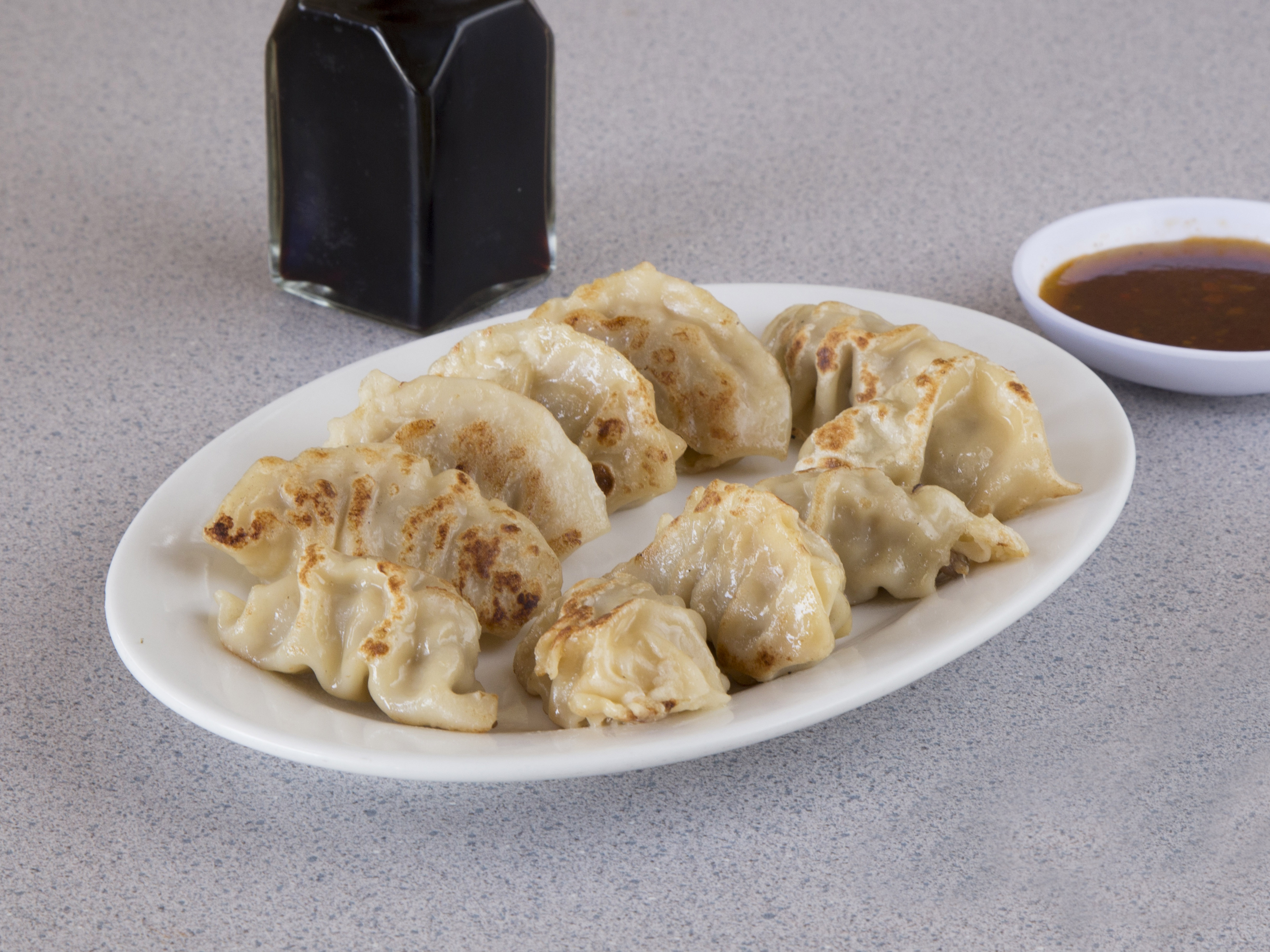 Order 2. Pot Stickers food online from Taste Of China store, Gilbert on bringmethat.com