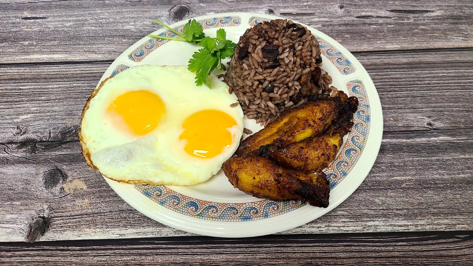Order A Lo Guajiro (Arroz+Huevos+ Maduros)/ Rice+Eggs +Fried Sweet Plantains food online from Havana Express Cuban Kitchen & Bakery store, Las Vegas on bringmethat.com