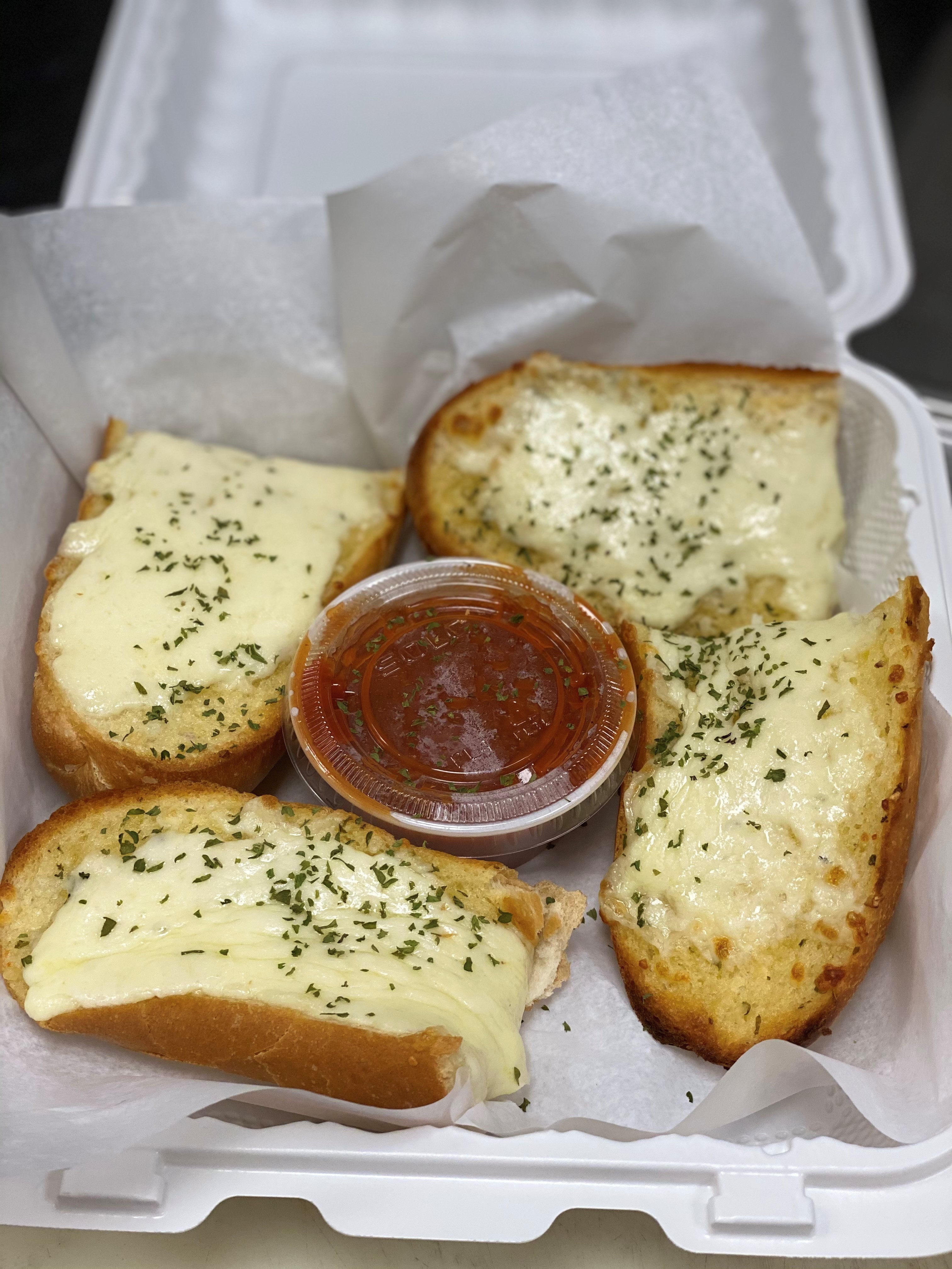 Order Garlic Bread with Cheese food online from Three Brothers Italian Restaurant store, Waldorf on bringmethat.com