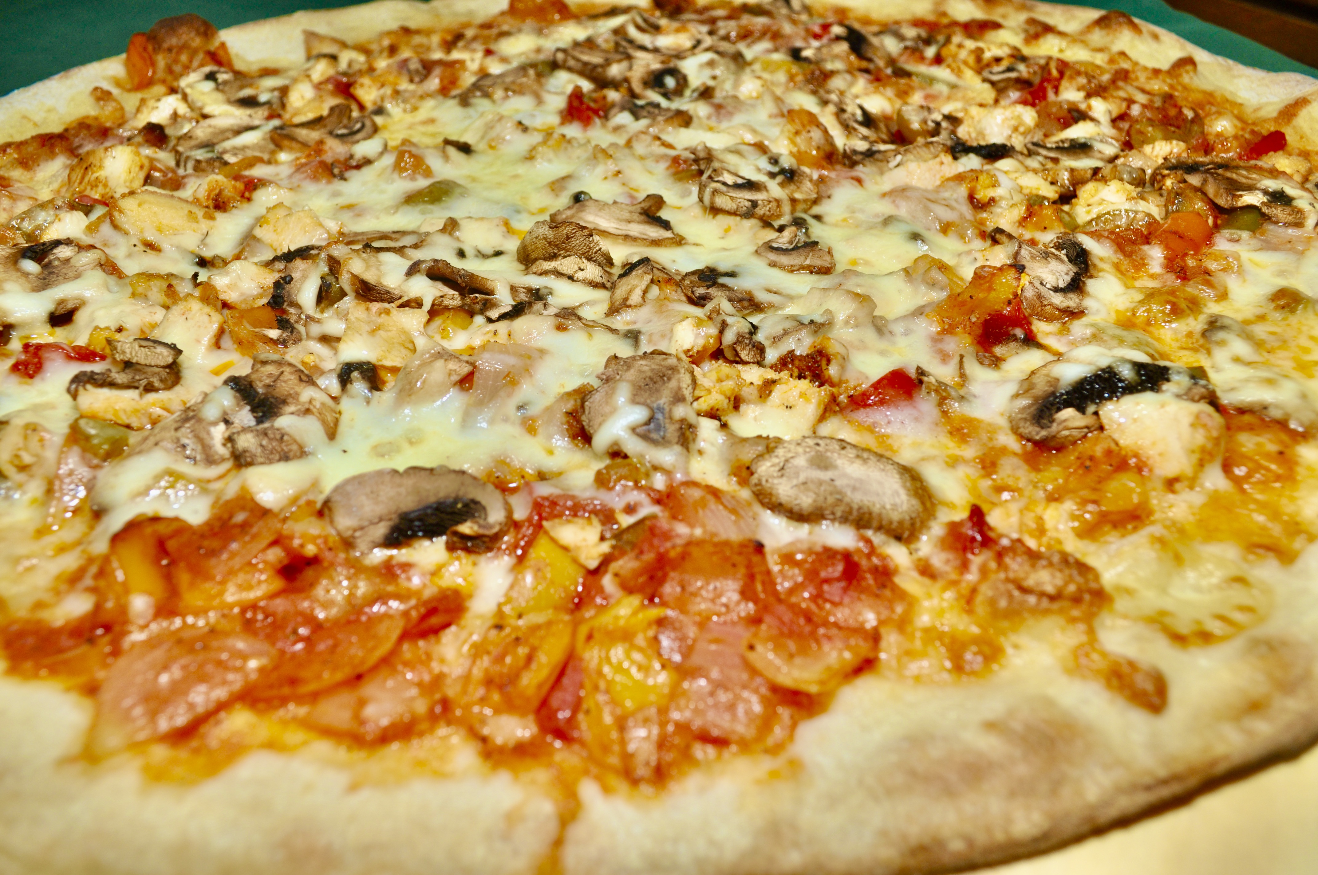Order 16" Chicken Cacciatore Pizza  food online from Illianos Grill store, Norwich on bringmethat.com