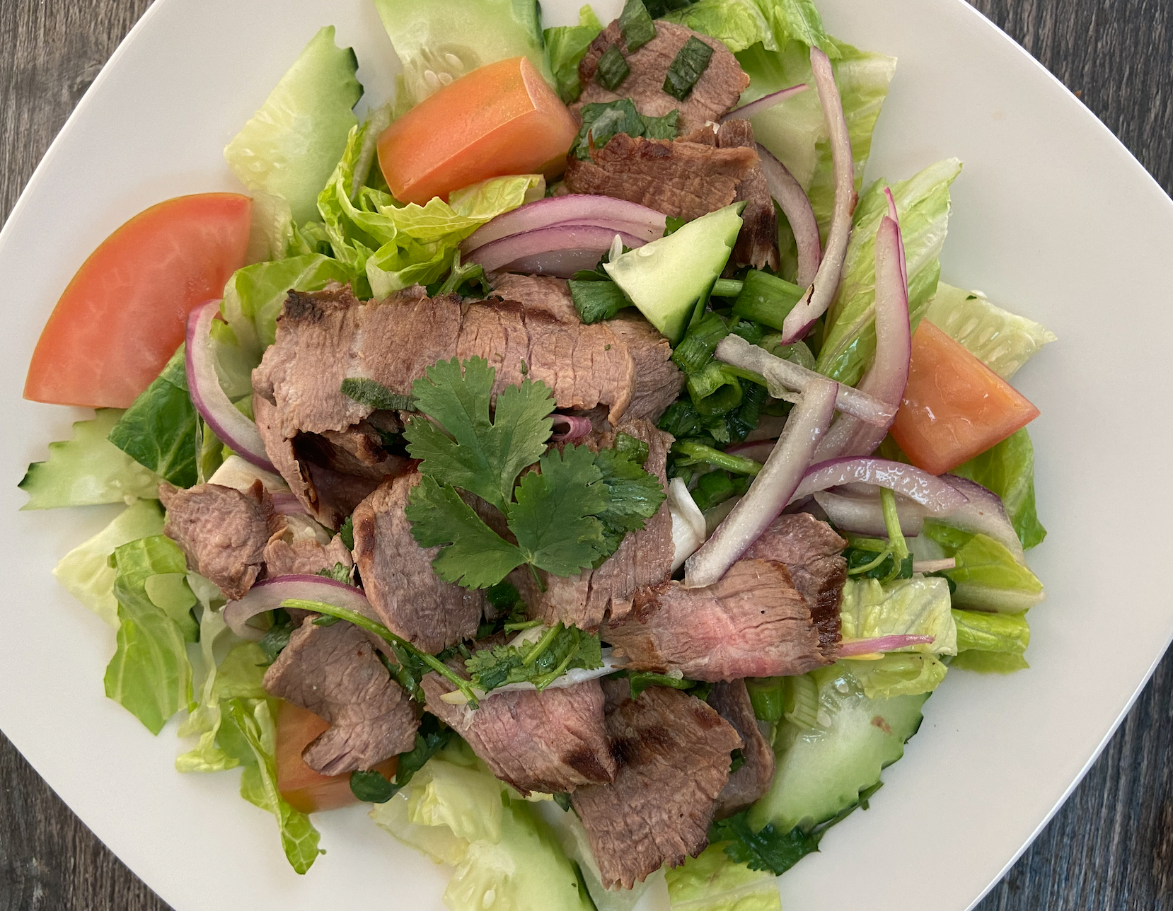 Order Beef Salad food online from Sriracha Thai Restaurant store, Carson on bringmethat.com