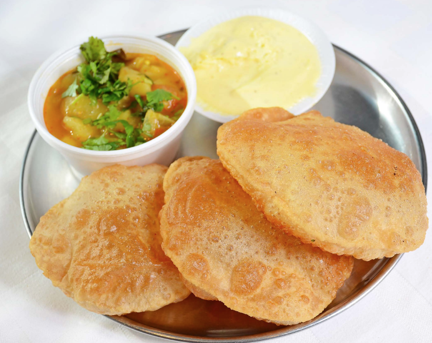 Order Srikhandh Puri with Sabji food online from Shri Balaji Bhavan store, Houston on bringmethat.com