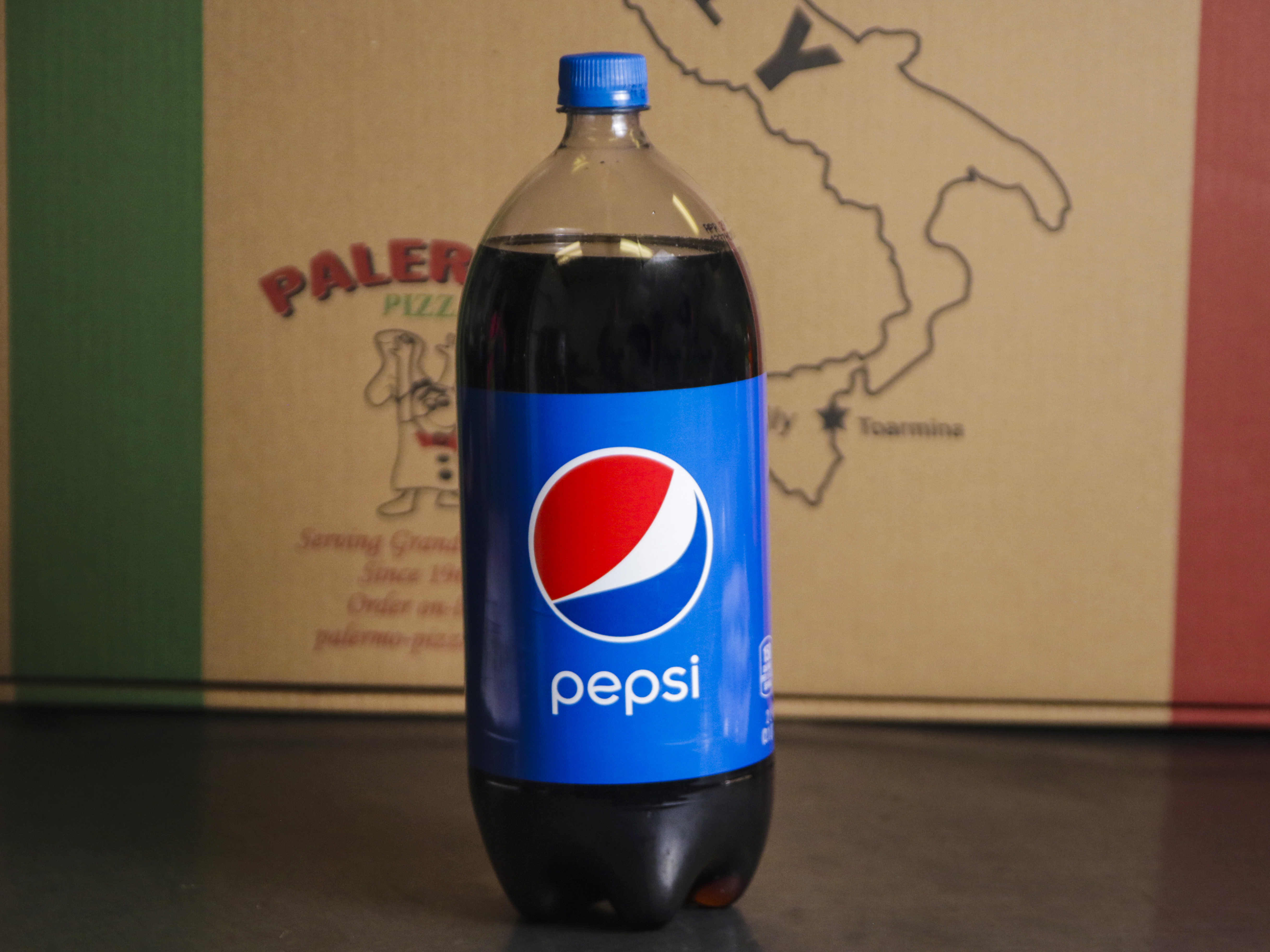 Order 2 liter Pepsi product food online from Toarmina Pizza store, Madison Heights on bringmethat.com
