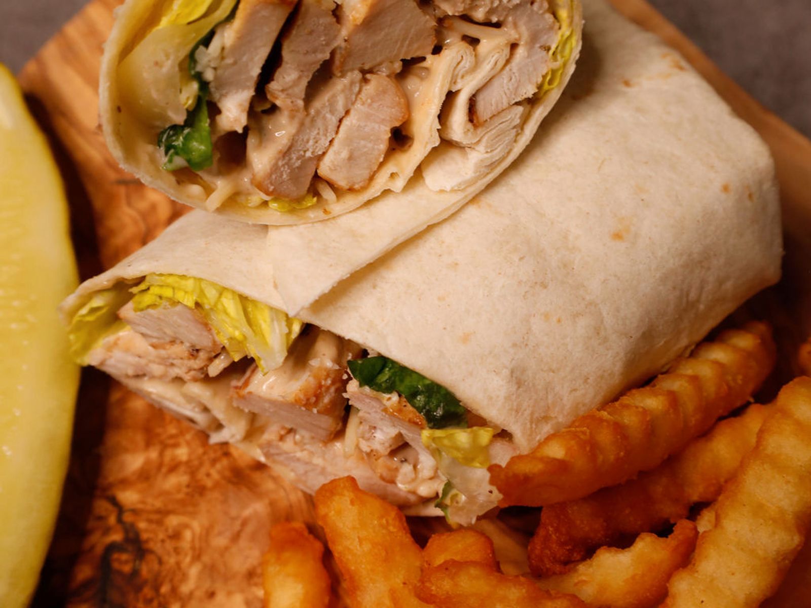 Order Chicken Caesar Wrap food online from 45th Street Pub store, Edgewater Park on bringmethat.com