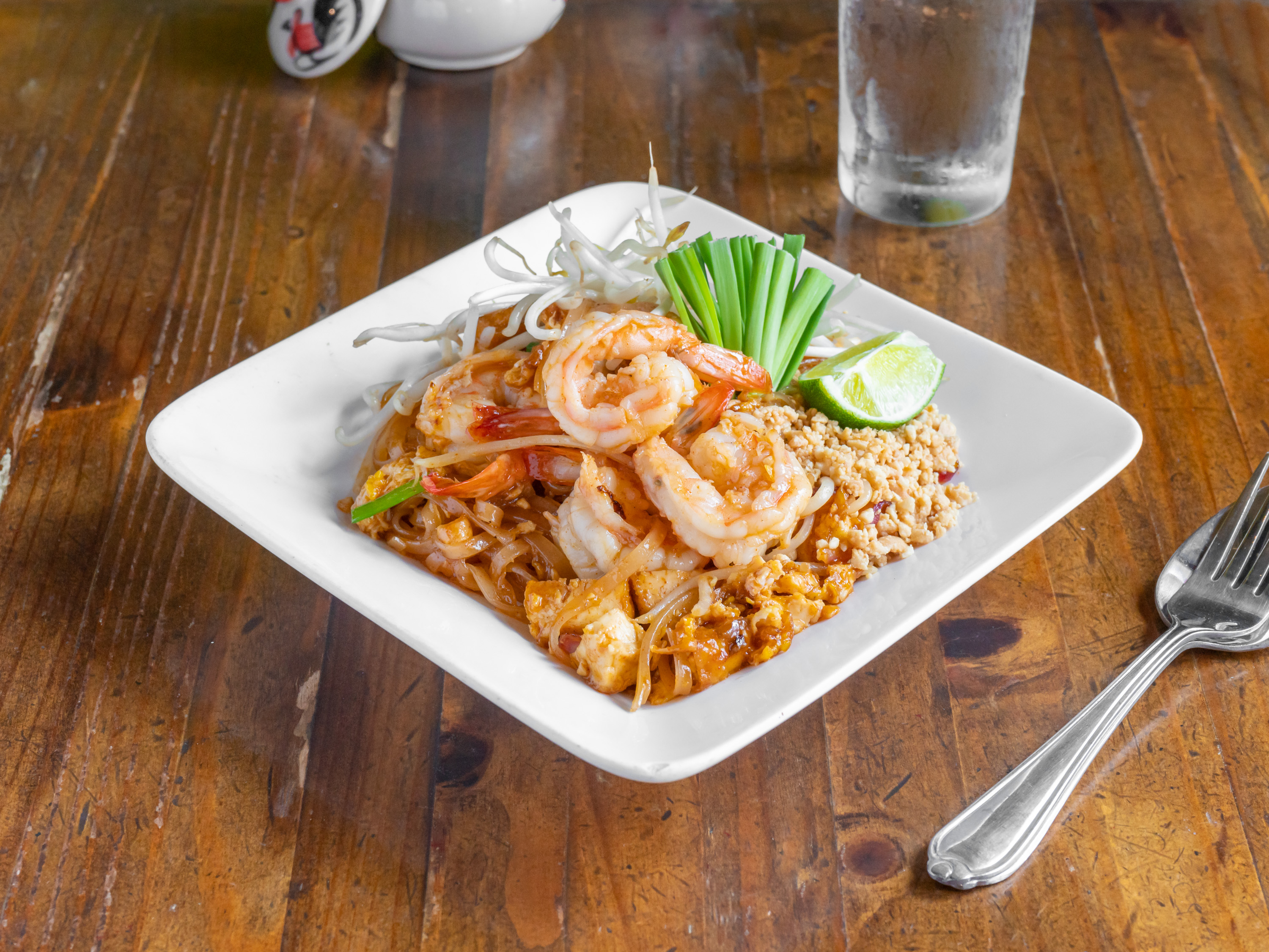 Order Pad Thai food online from Basil Thai Restaurant & Bar store, San Francisco on bringmethat.com