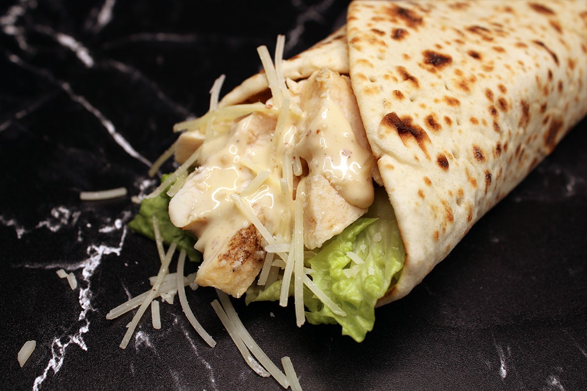 Order Chicken Caesar Wrap food online from Nestle Toll House Cafe store, Fort Worth on bringmethat.com
