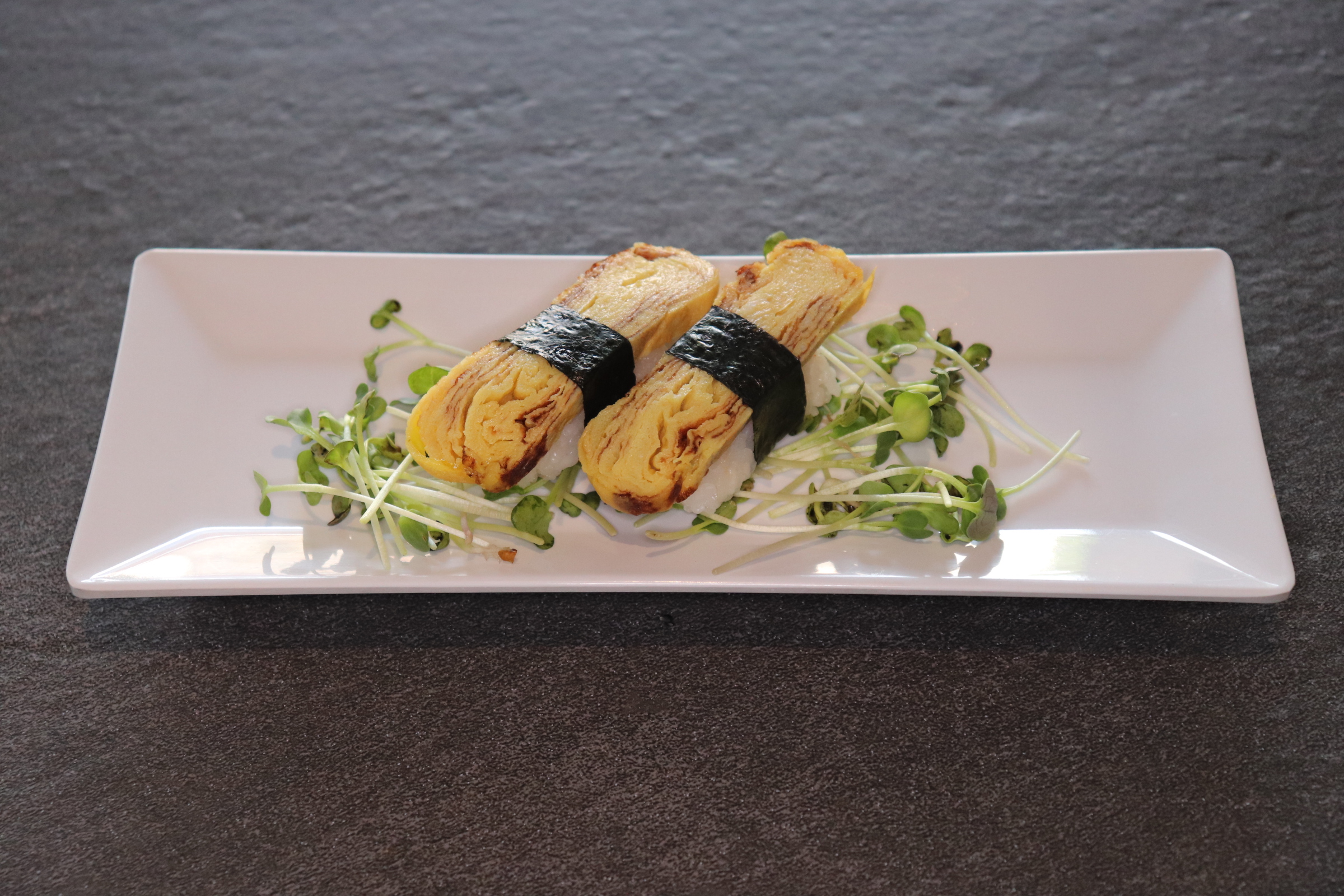 Order Tomago Sushi food online from Toshiko Japanese Cuisine store, Hanford on bringmethat.com