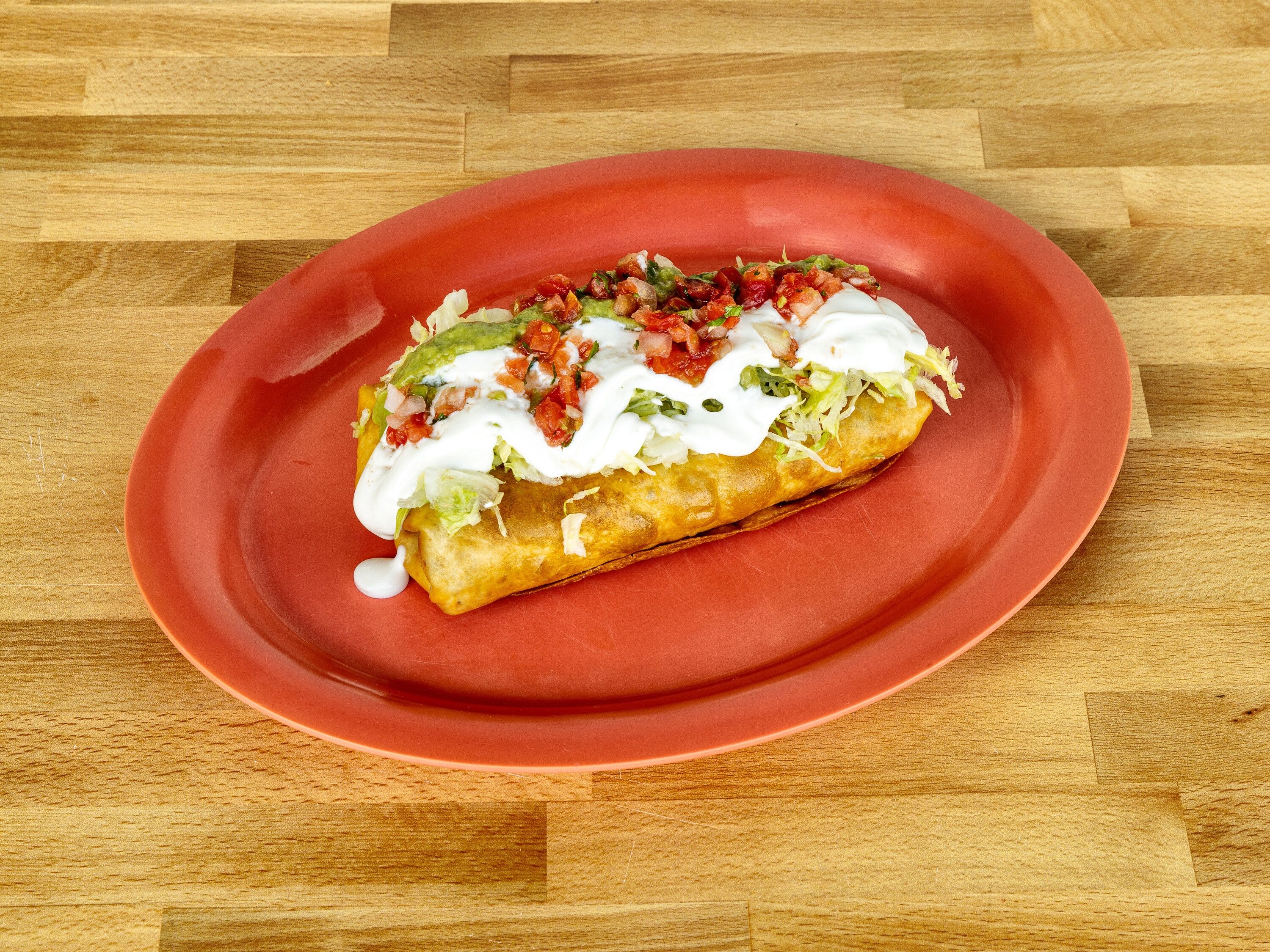 Order Traditional Chimichanga food online from Taqueria Alonzo store, Corvallis on bringmethat.com