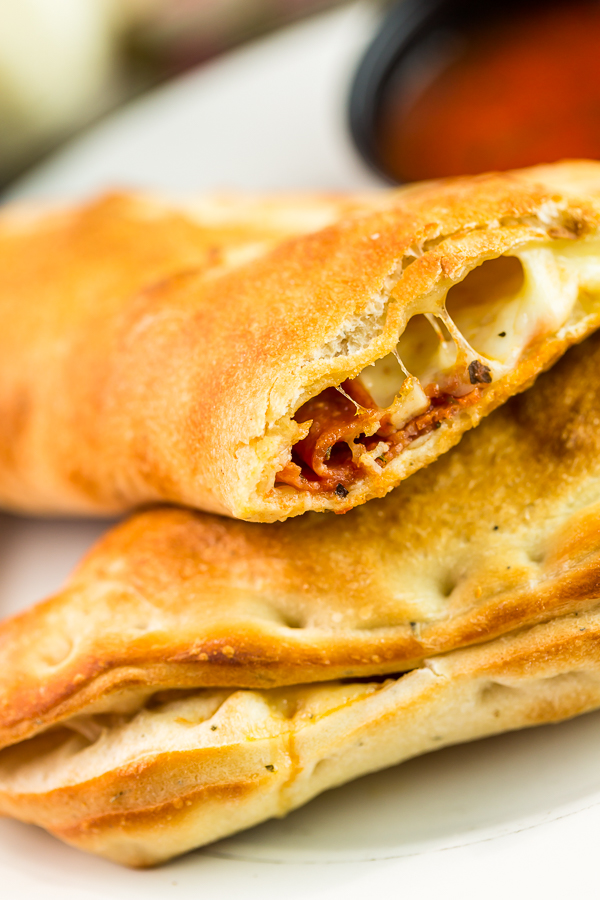 Order Chicken Pine Nut Calzone food online from Tony P Lohi store, Denver on bringmethat.com
