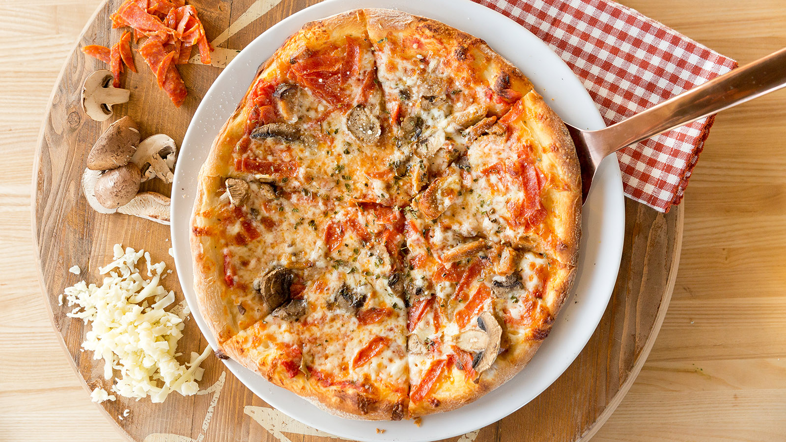 Order Mushroom Pepperoni and Sausage Pizza food online from Babbo Italian Eatery store, Phoenix on bringmethat.com