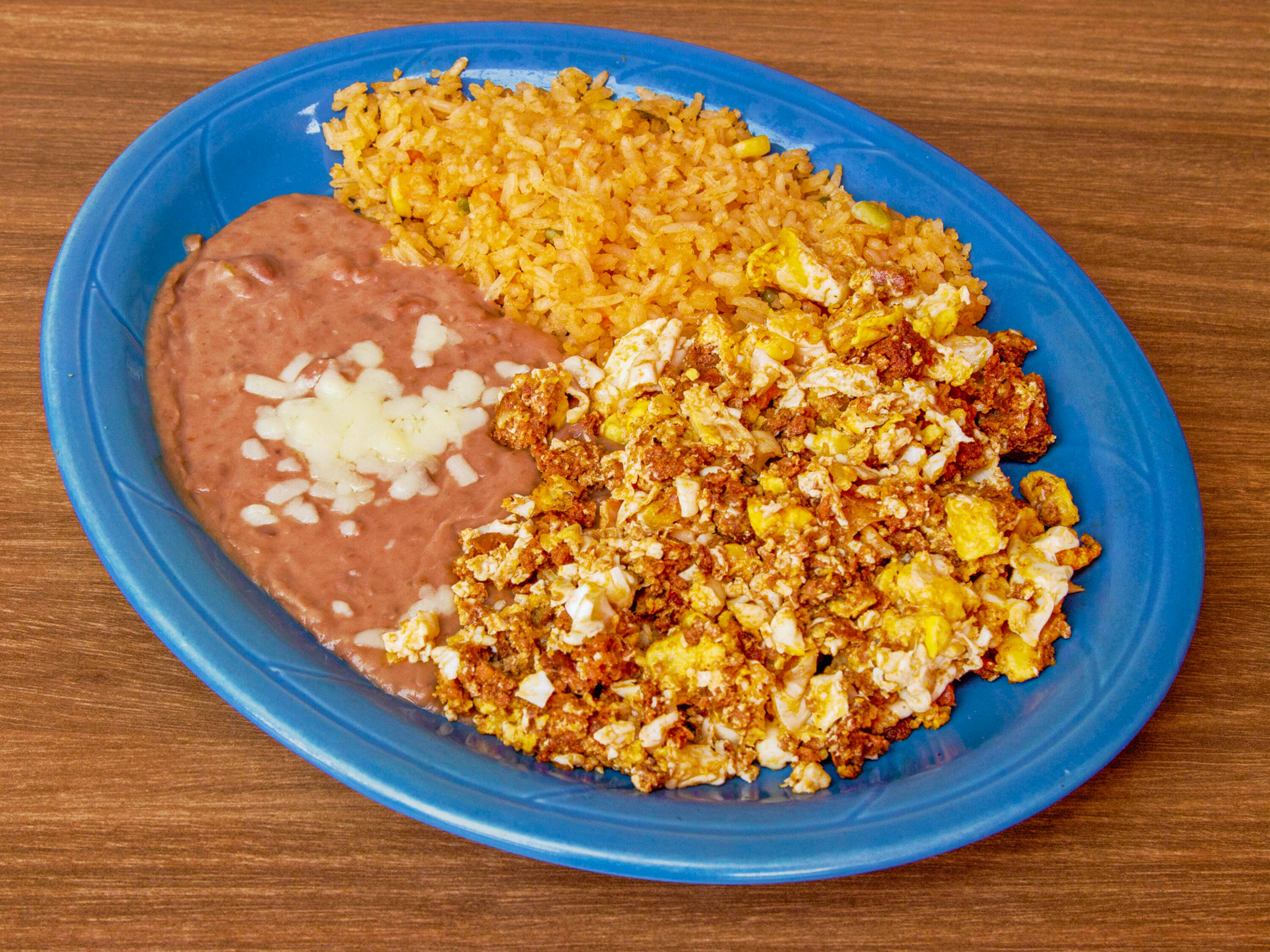 Order Huevos con Chorizo Lunch  food online from Amigo's Tequila Mexican Grill - Harvest Mill Way store, Knoxville on bringmethat.com