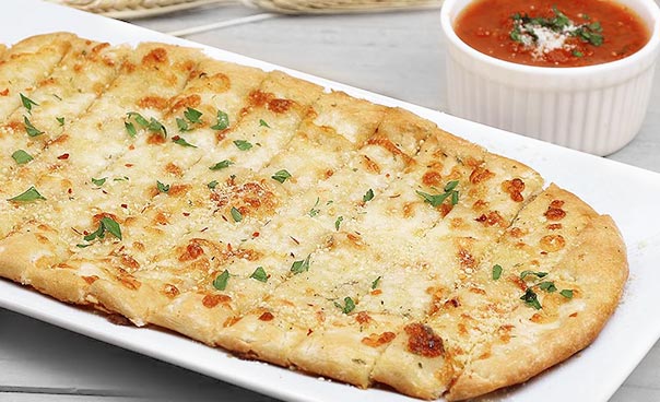 Order 12 Pieces Bread Sticks with Cheese food online from Sicily Pizza & Pasta store, Spring on bringmethat.com