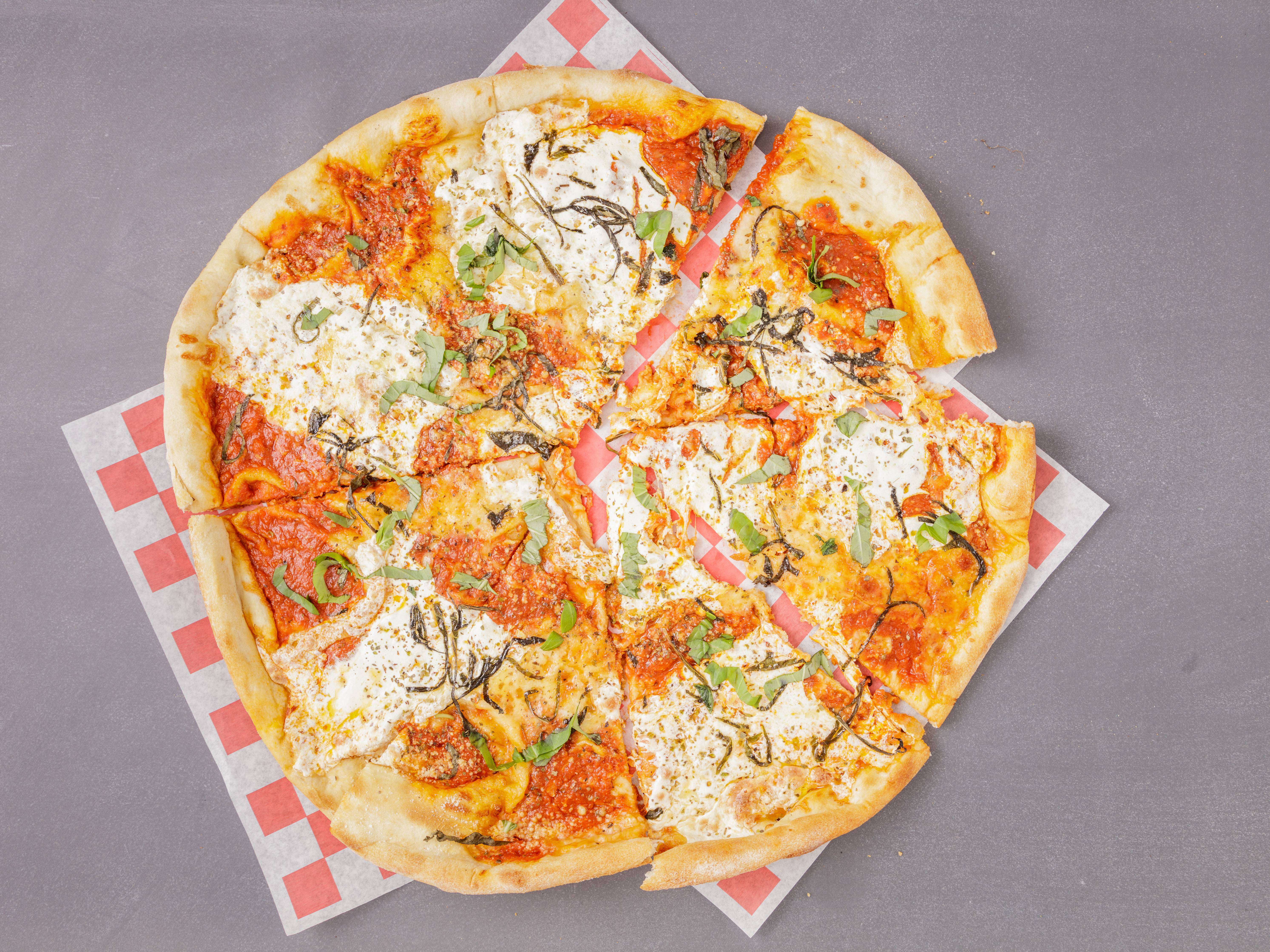 Order Margherita Pizza Slice food online from Village Pizzeria store, Goshen on bringmethat.com