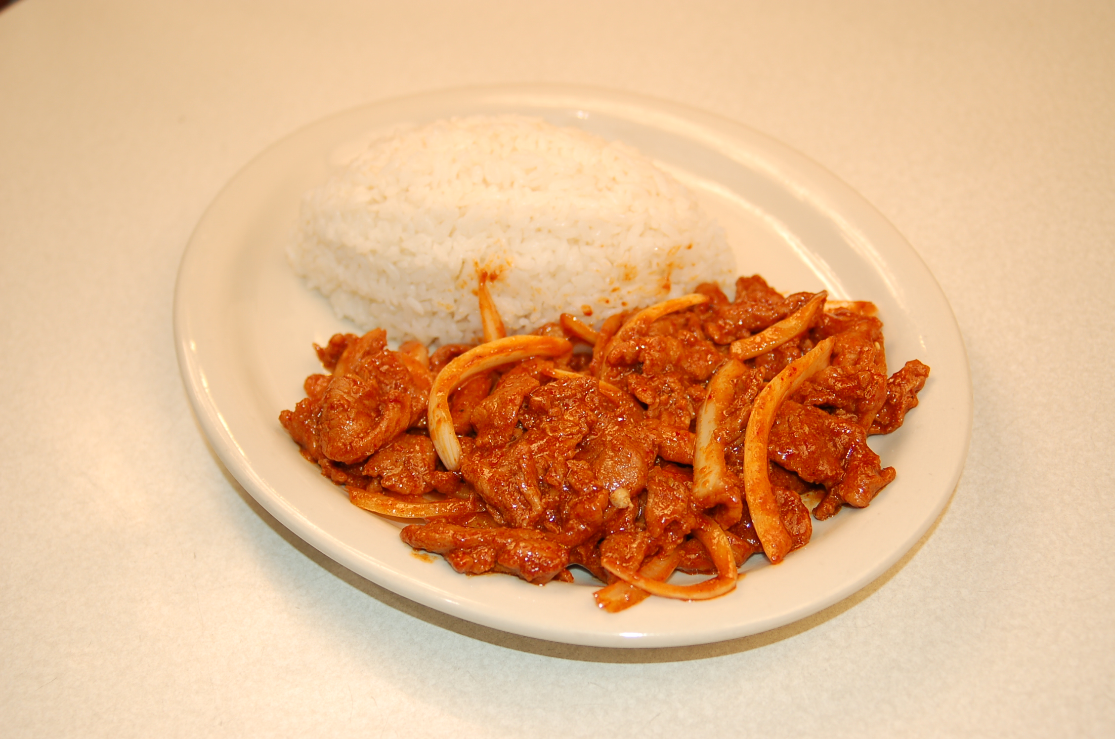 Order Spicy Pork & Onion food online from Bulgogi Korean Bbq store, Bellevue on bringmethat.com