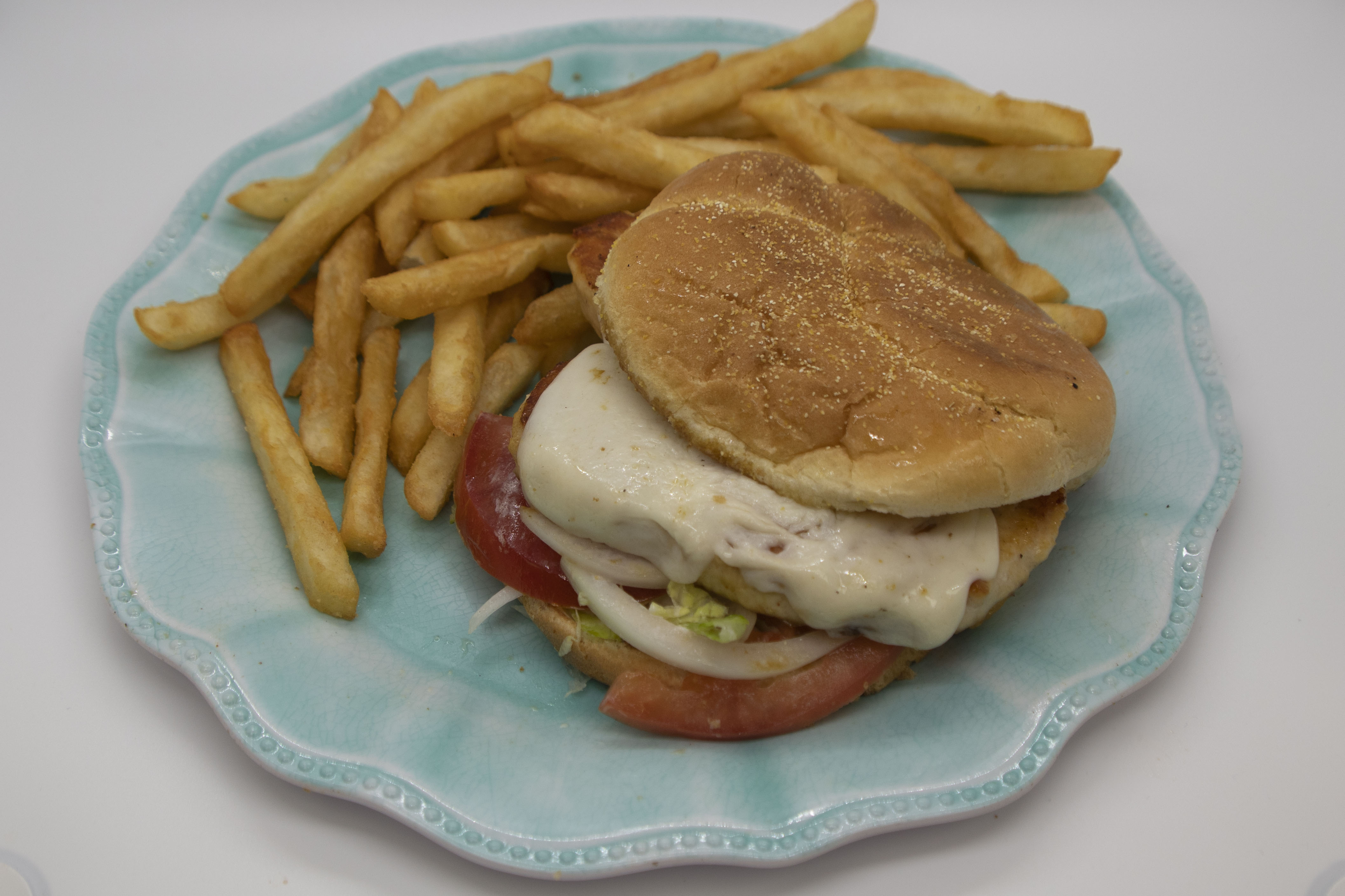 Order Garlic Chicken Sandwich with Fries food online from Baba Famous Steak And Lemonade store, Fort Wayne on bringmethat.com