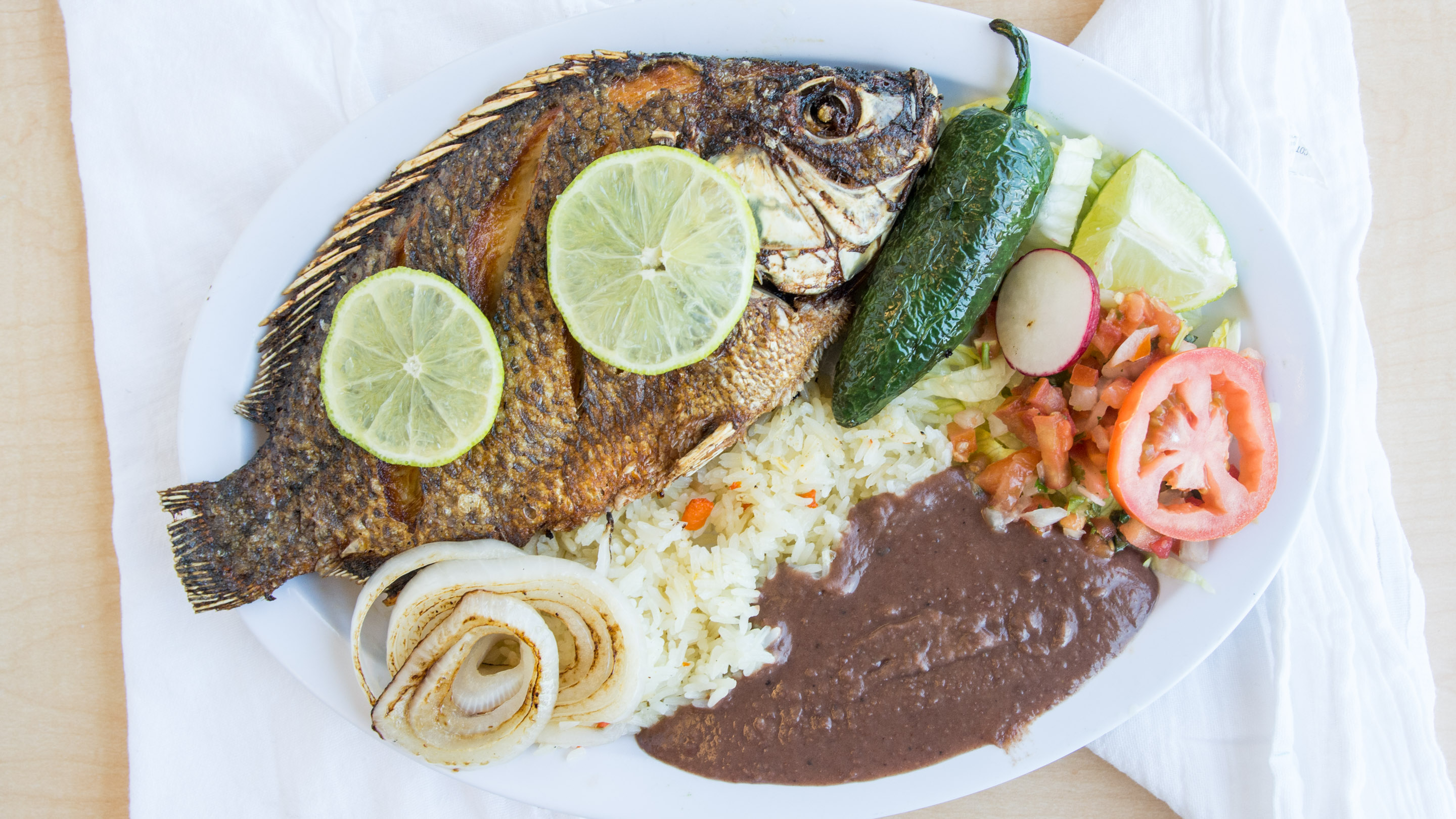Order Pescado Frito food online from Paradise Restaurant store, Winchester on bringmethat.com